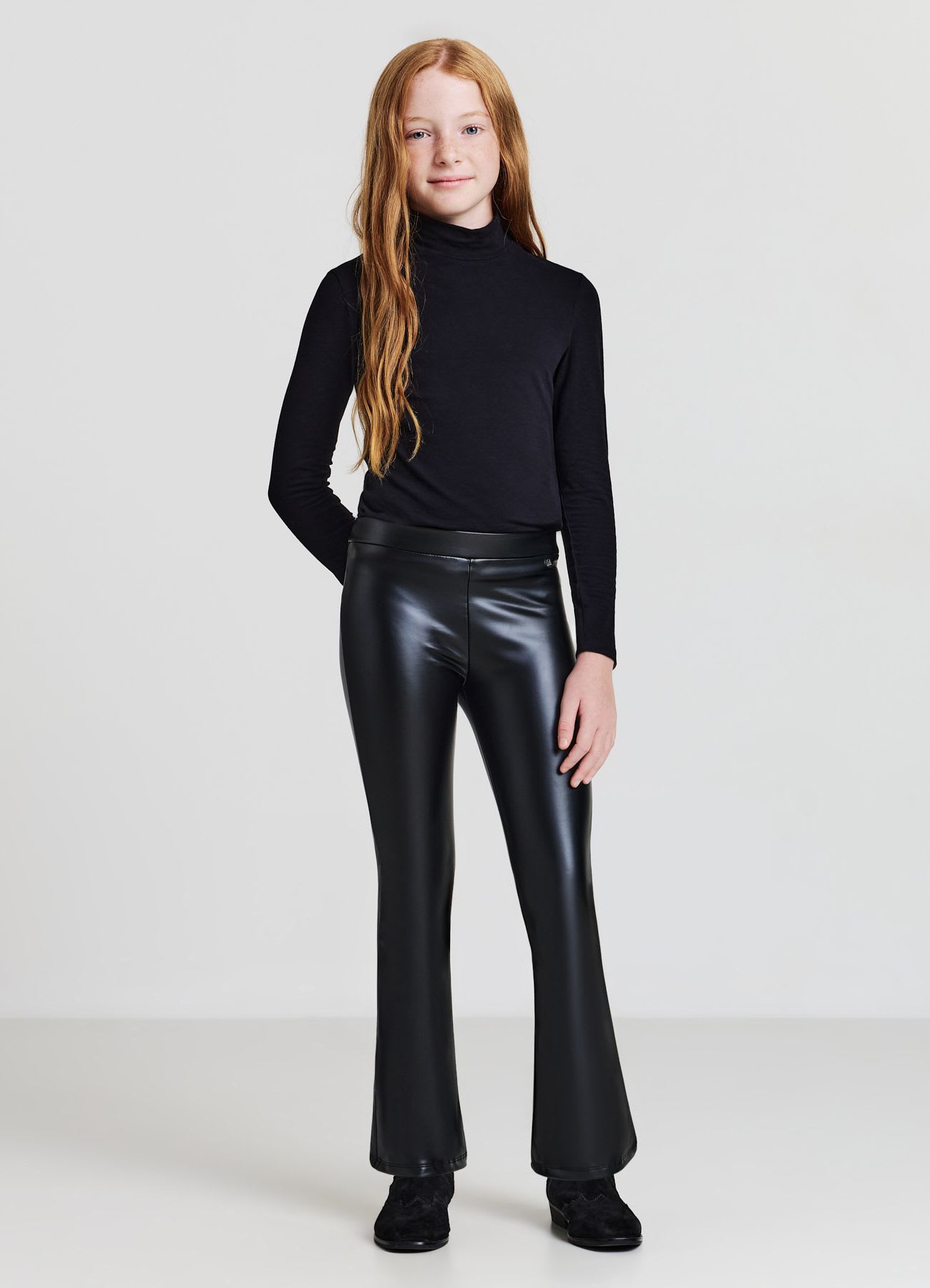 Leggings a zampa effetto pelle