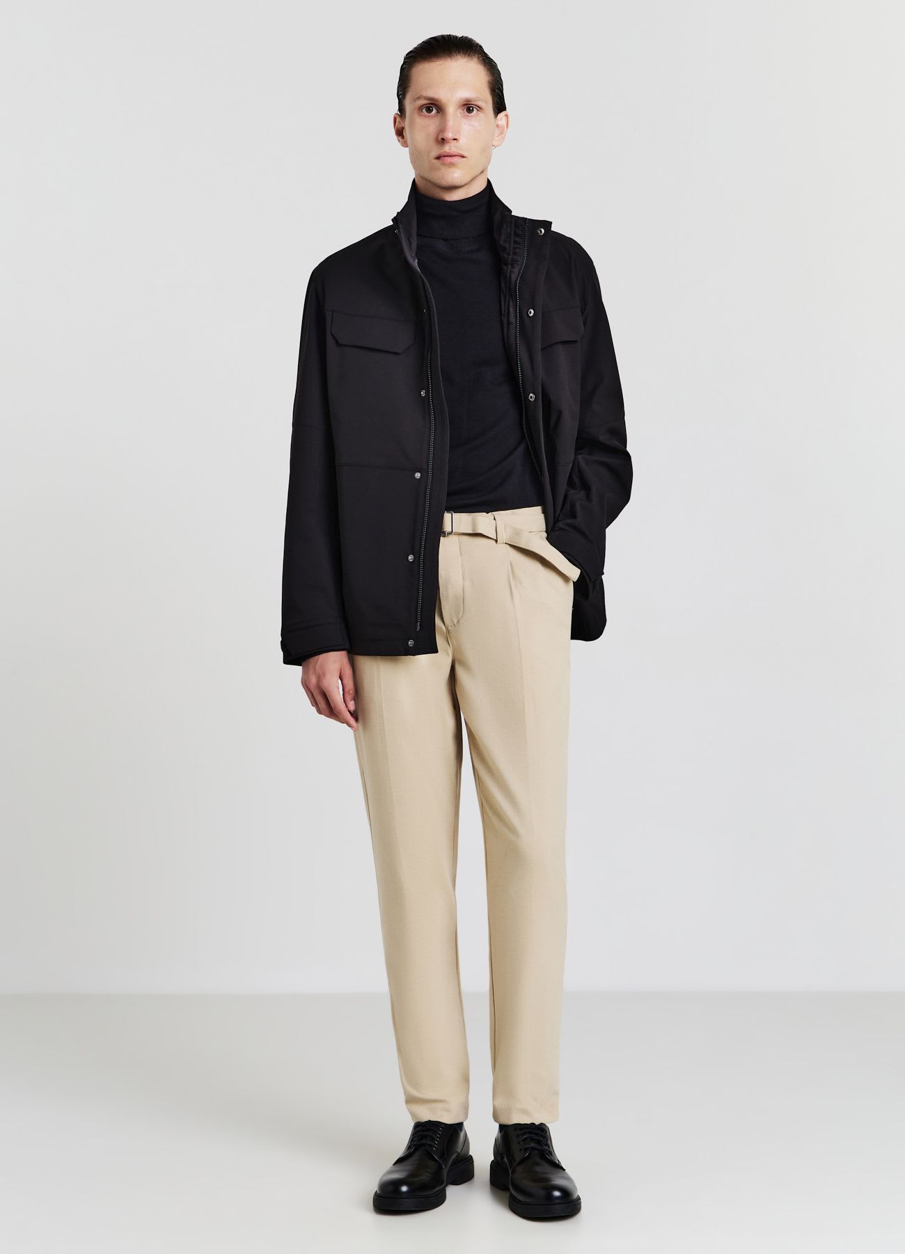Pantaloni con fusciacca
