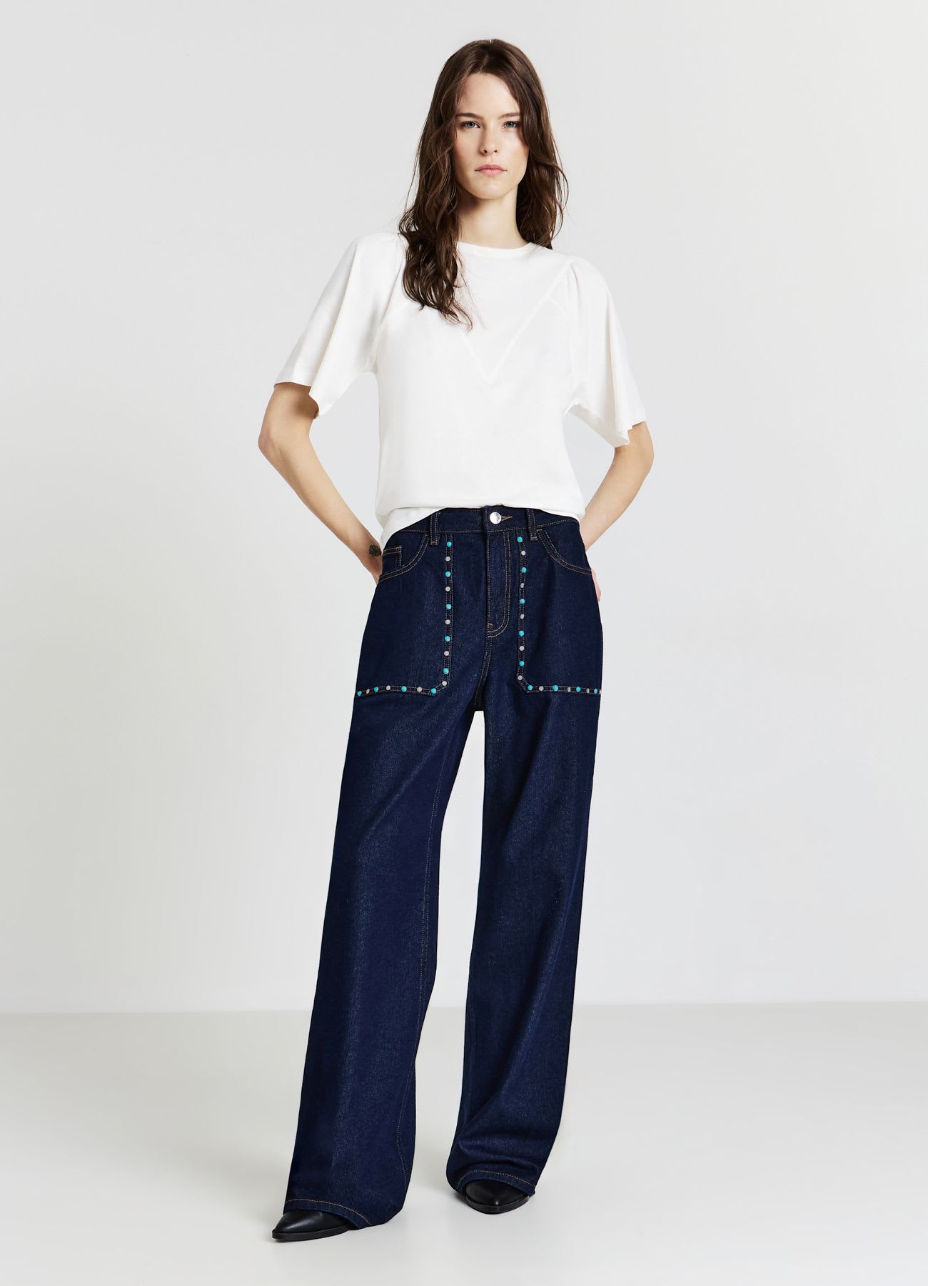 Jeans con borchie