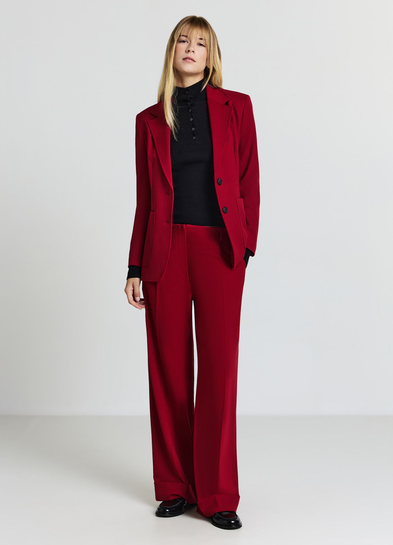 Pantaloni palazzo con risvolto