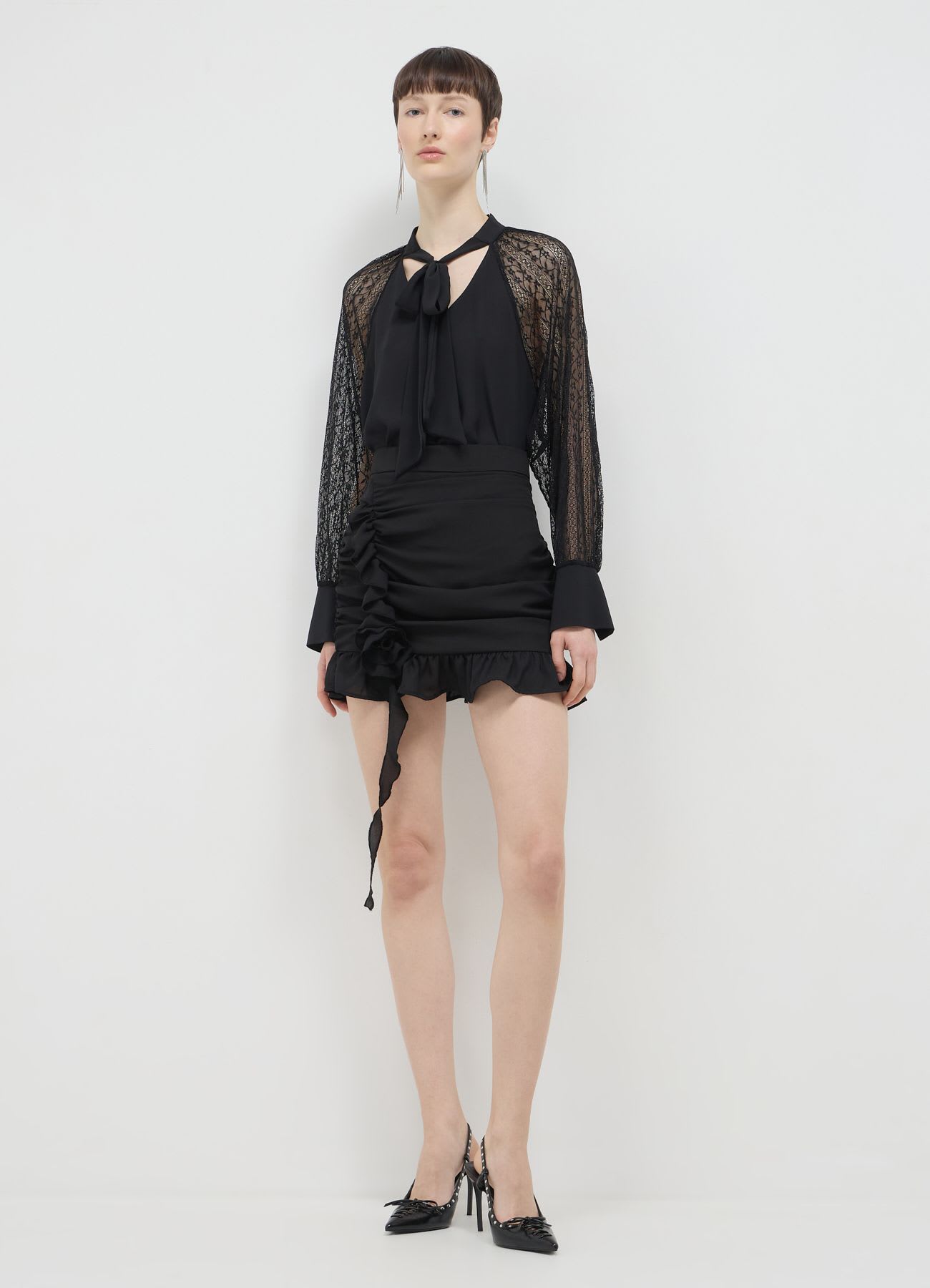 Blusa fiocco e maniche pizzo