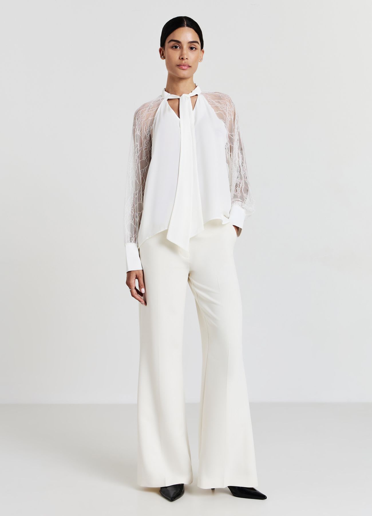 Blusa fiocco maniche pizzo