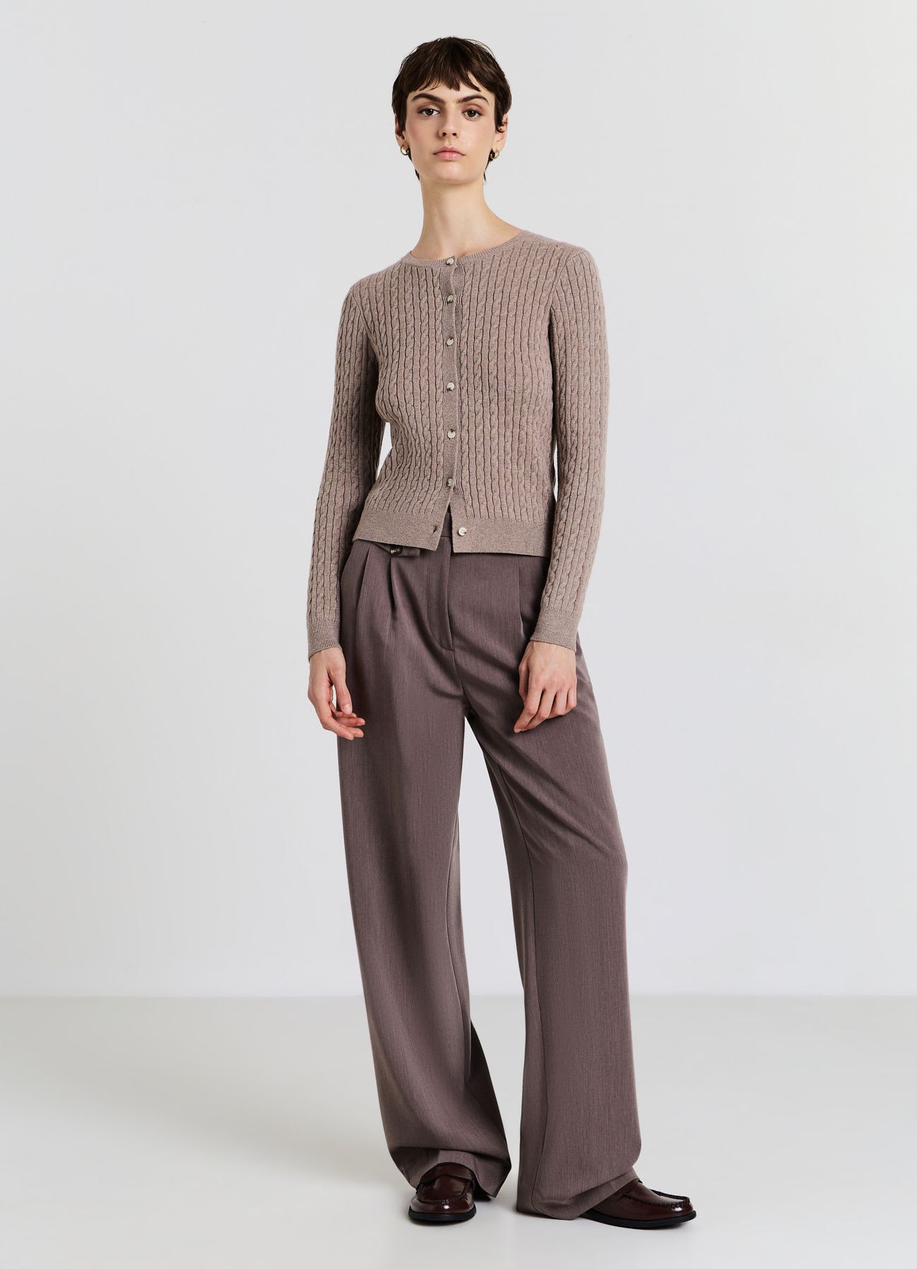 Cardigan con trecce