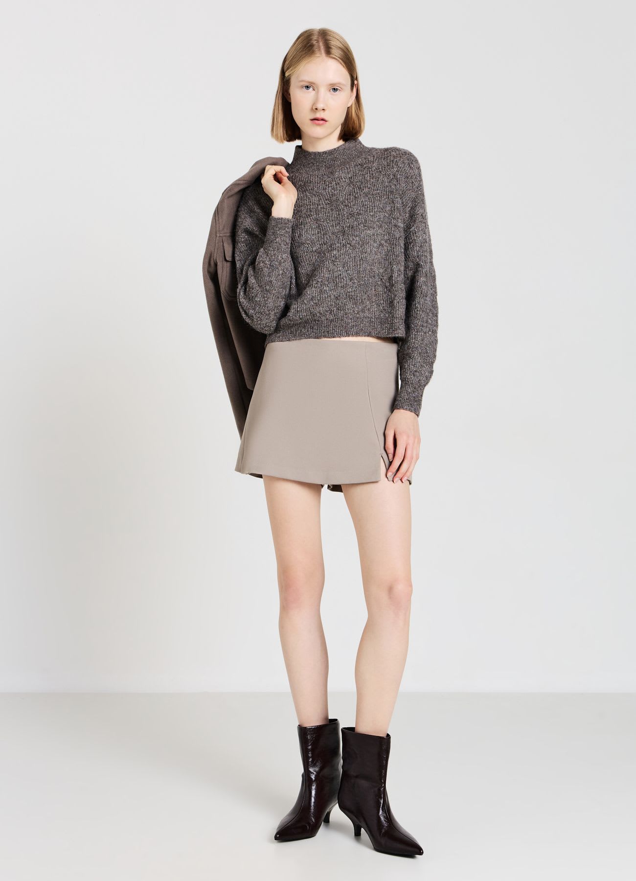 Maglia con trecce