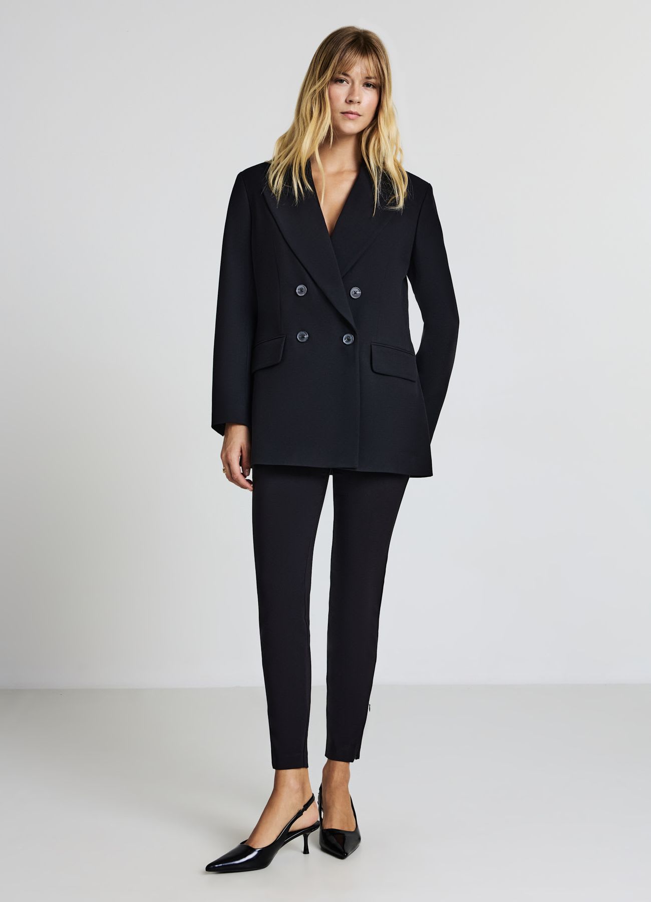 Pantaloni skinny vita alta