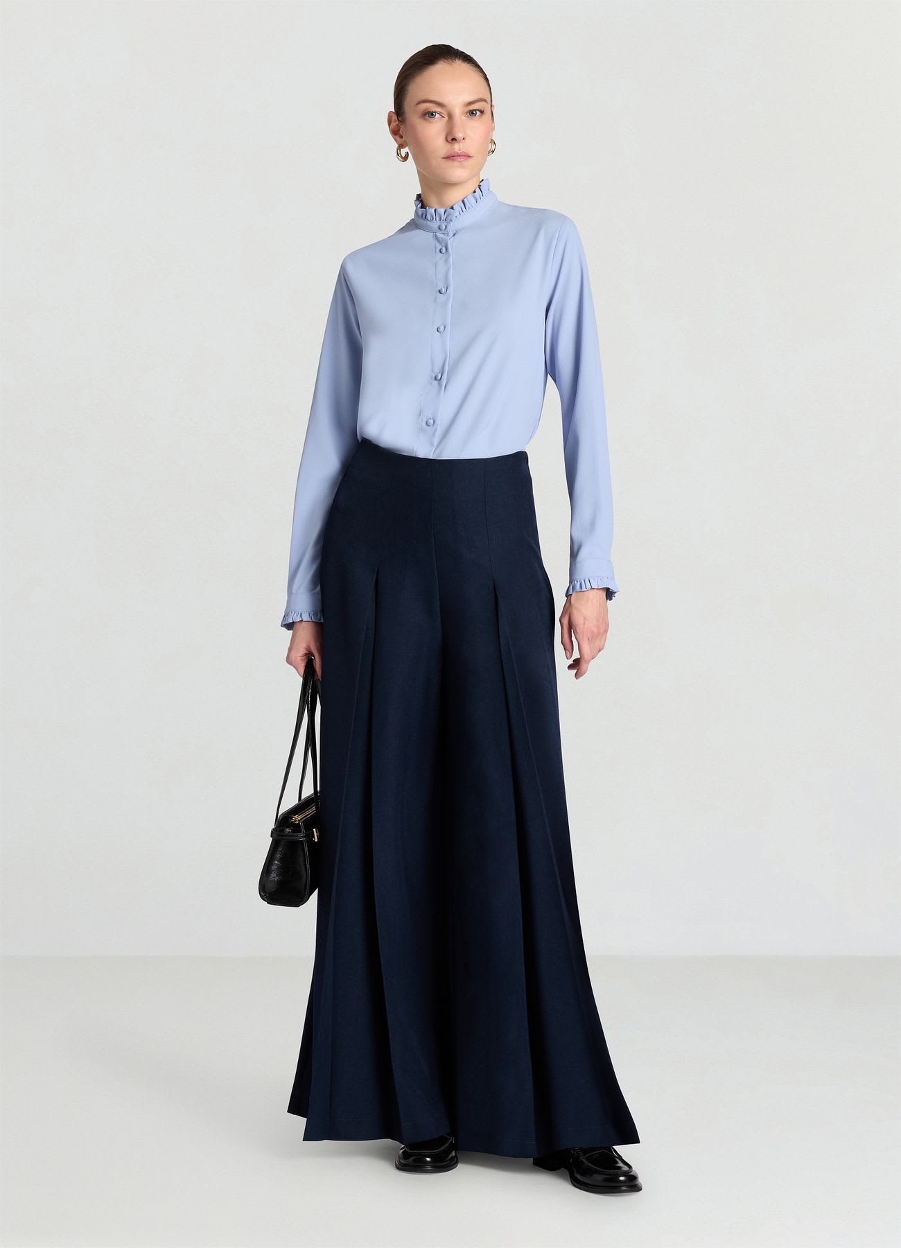 Pantaloni palazzo ampi con pieghe