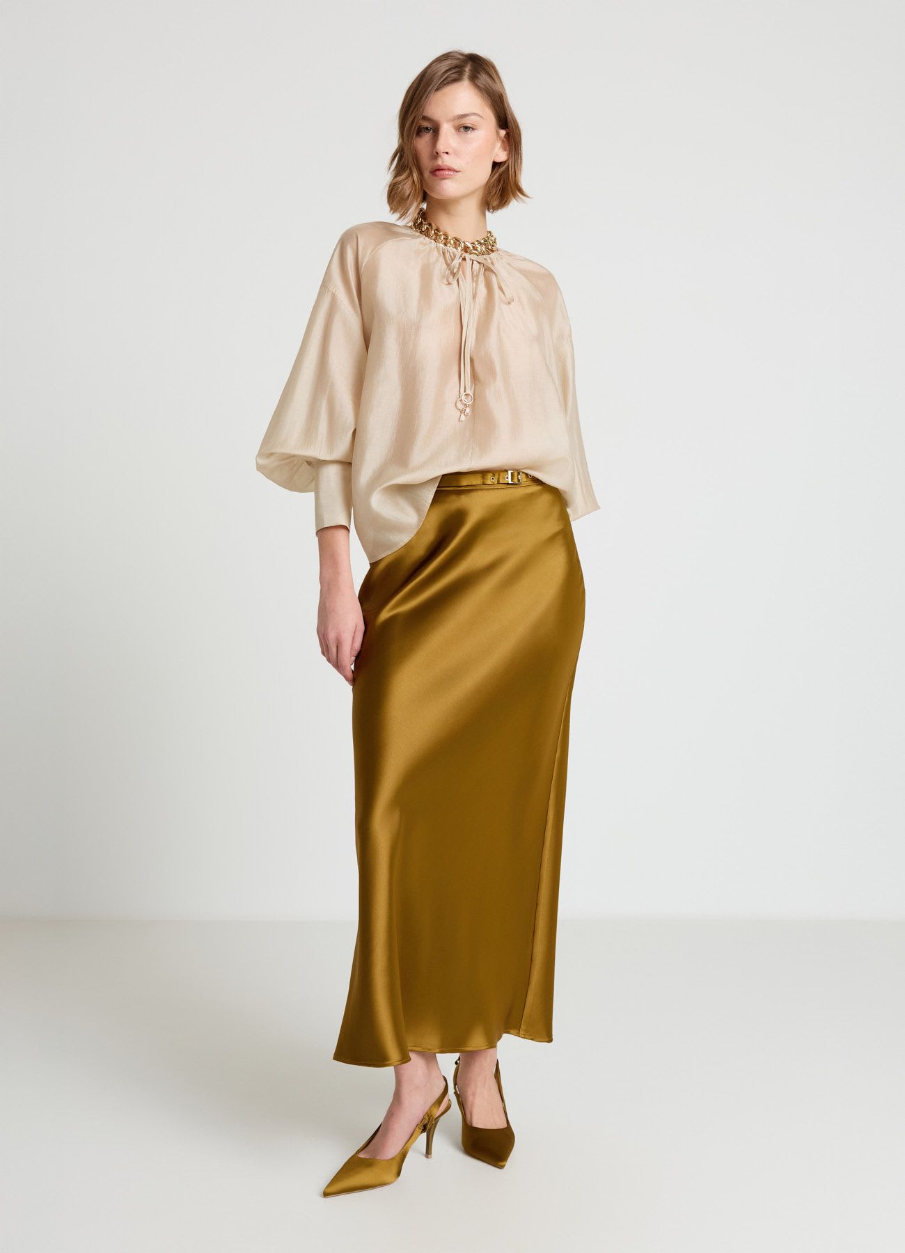 Blusa ampia tinta unita