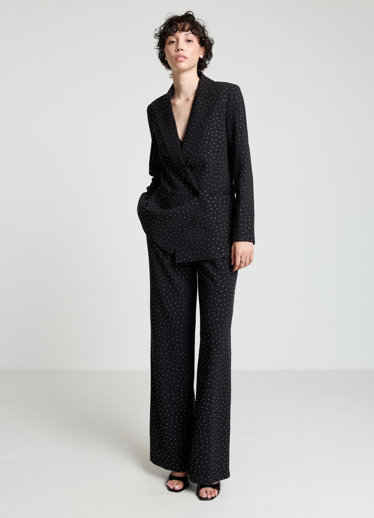 Pantaloni palazzo con strass