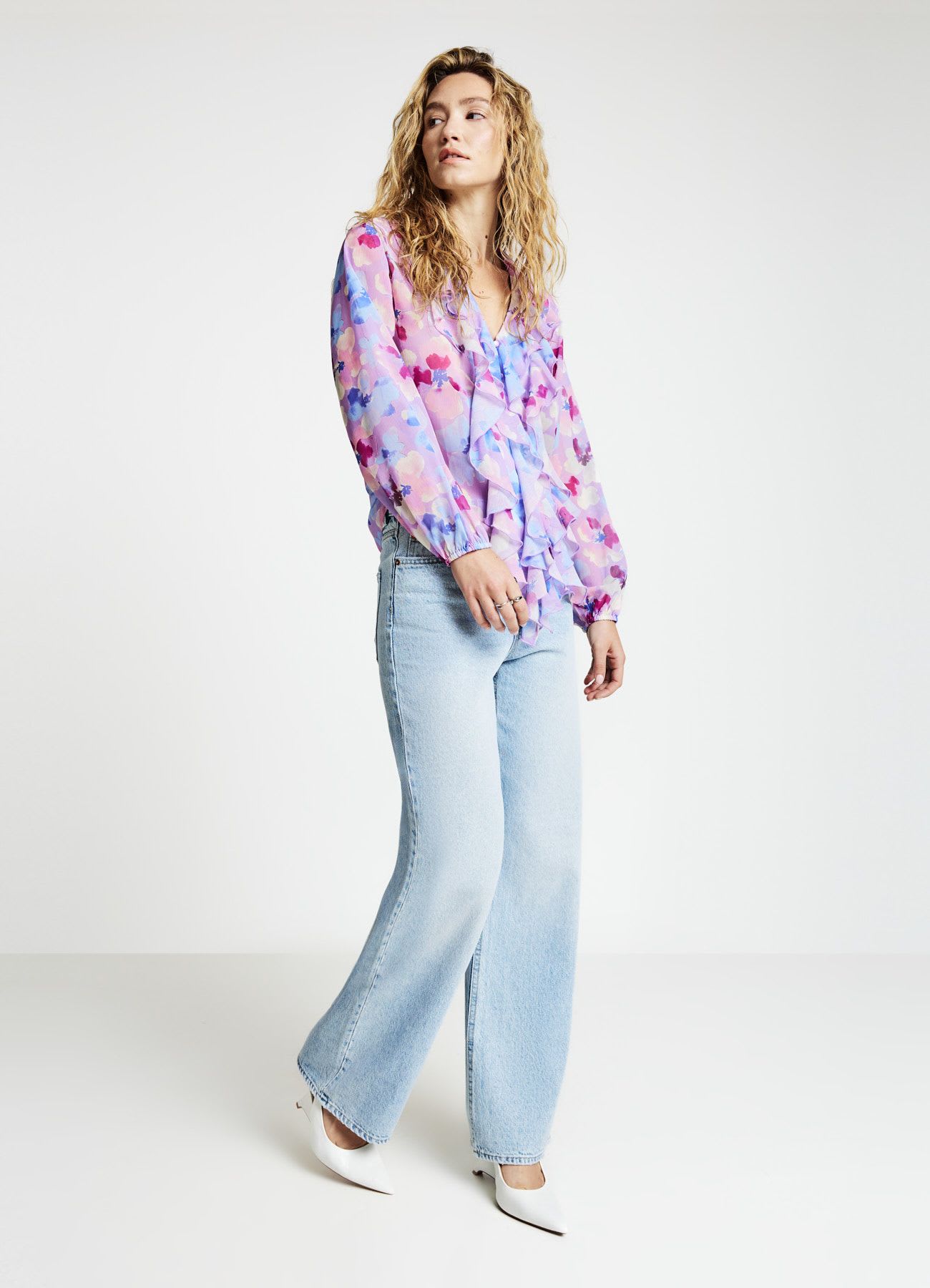 Blusa con volant e stampa fiori
