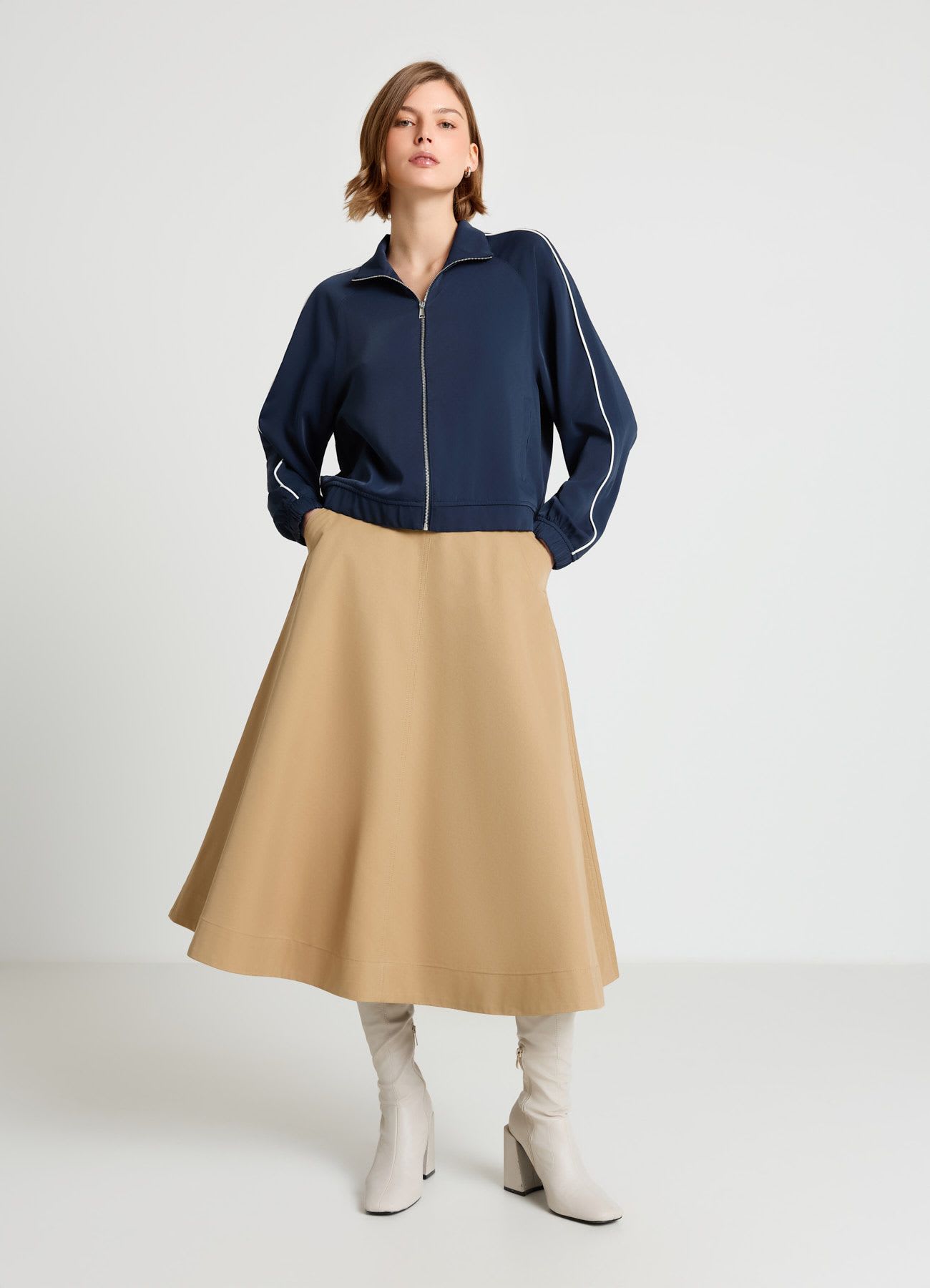 Gonna longuette svasata con tasche