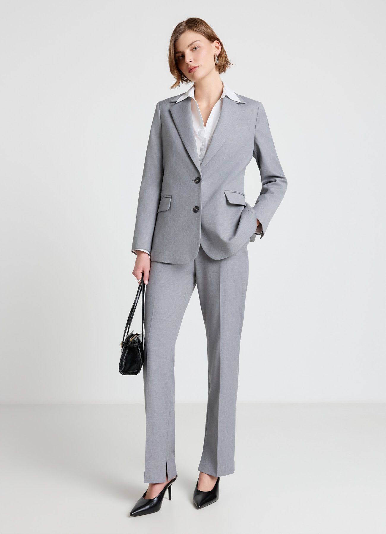 Pantaloni slim con spacchetti