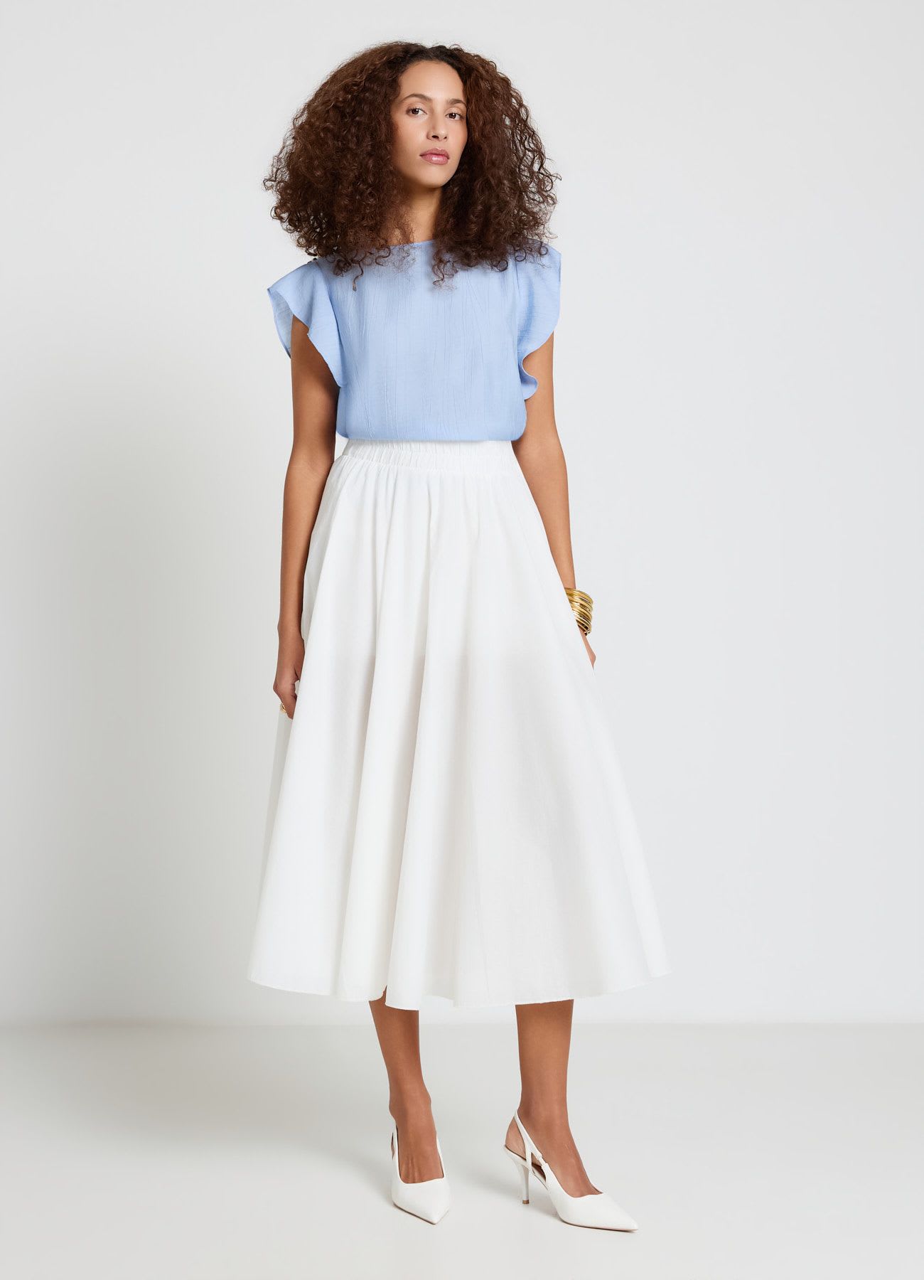 Blusa con maniche a volant