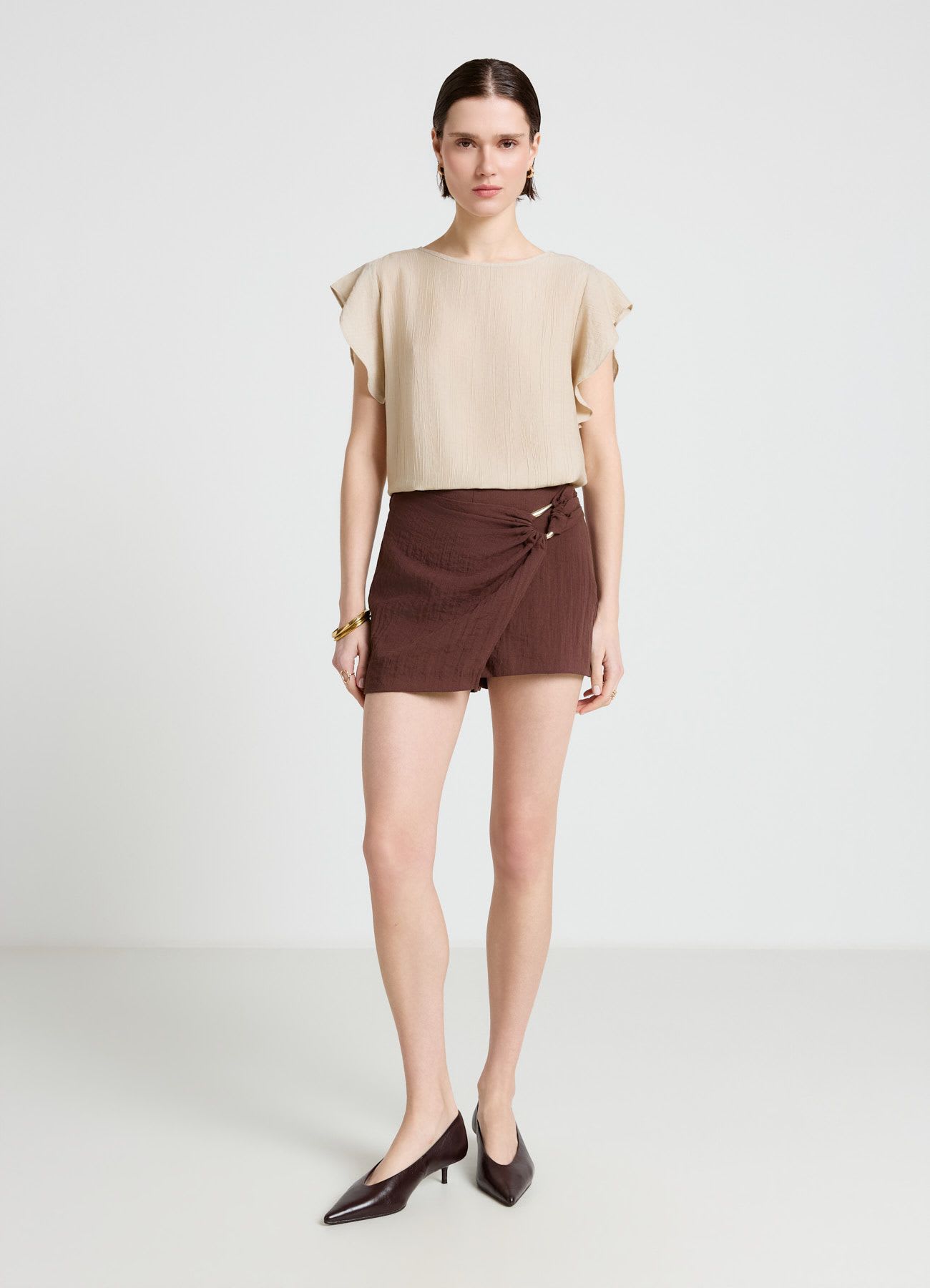 Blusa con maniche a volant