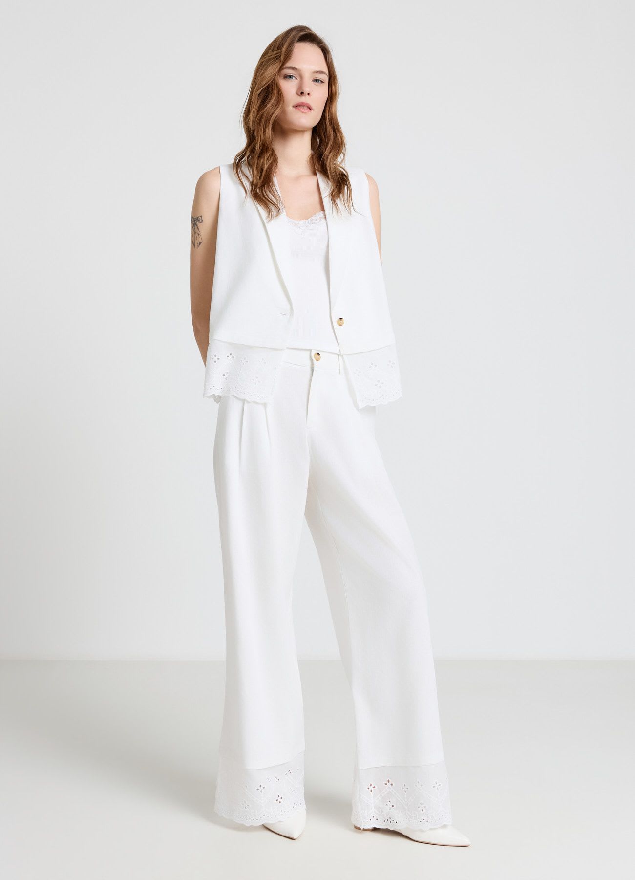 Pantaloni palazzo con balza sangallo