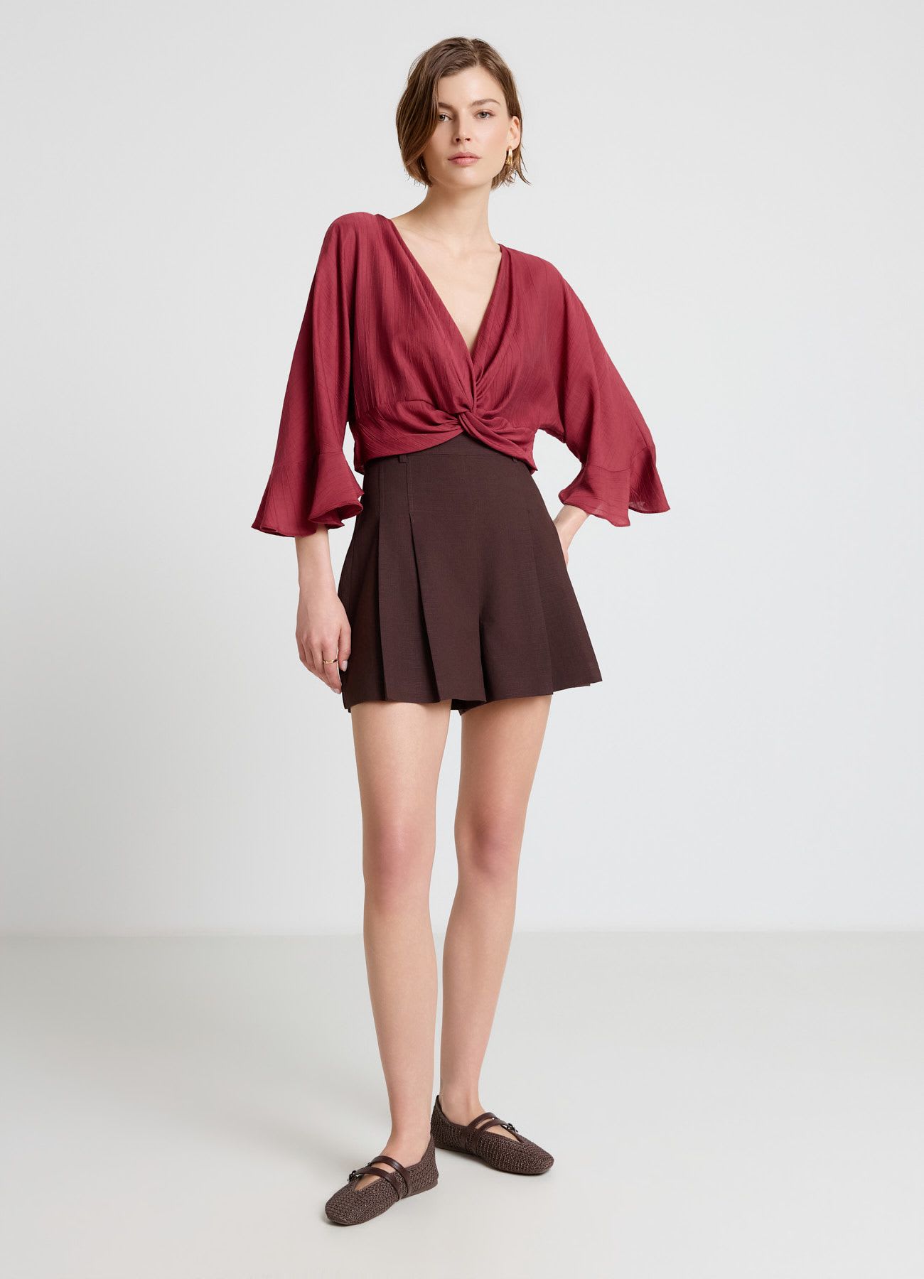 Camicia con nodo con volant
