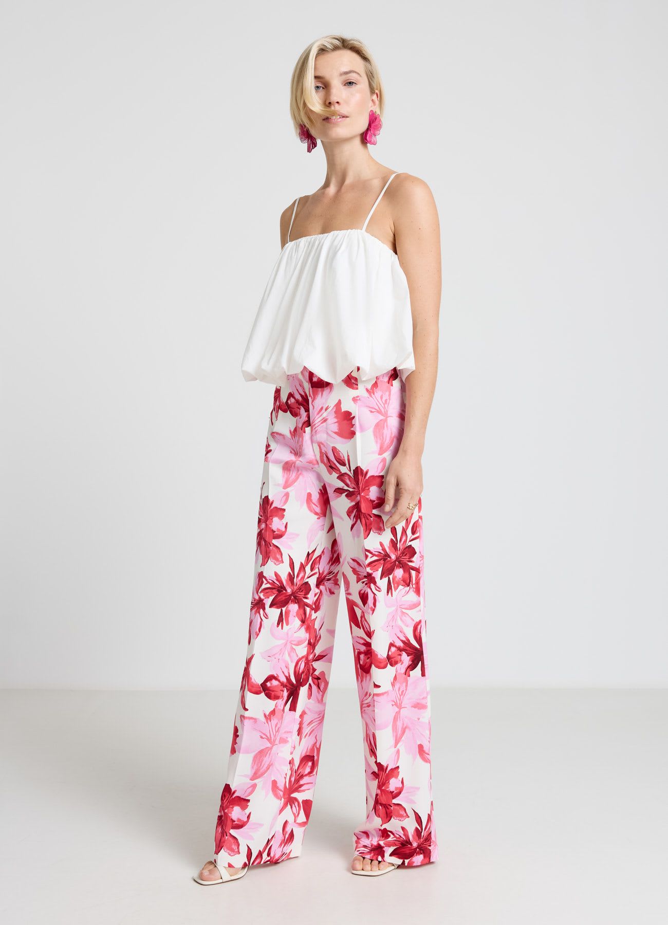 Pantaloni palazzo similsatin con stampa floreale