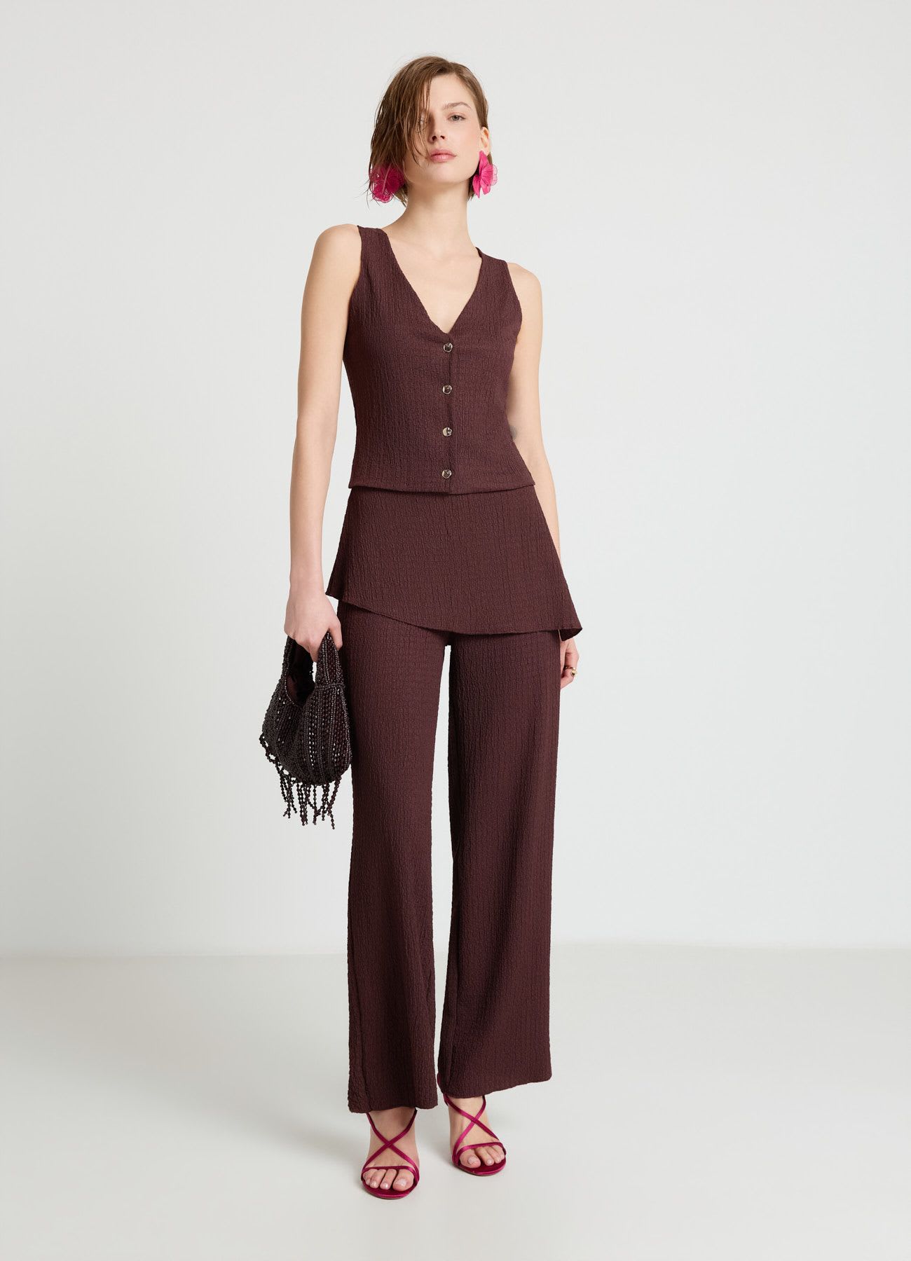 Gilet con scollo a V e bottoni