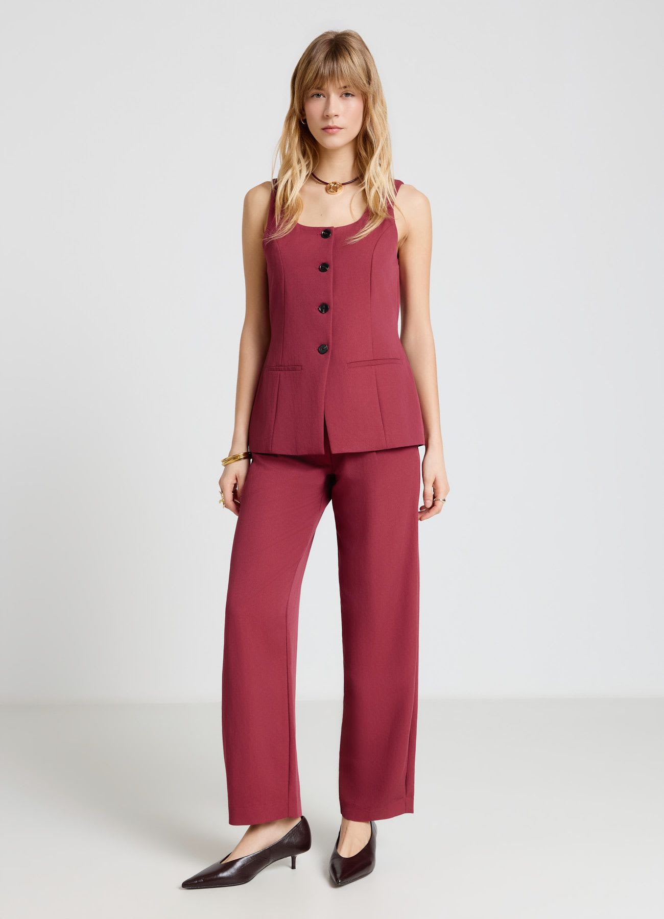 Gilet lungo svasato con bottoni