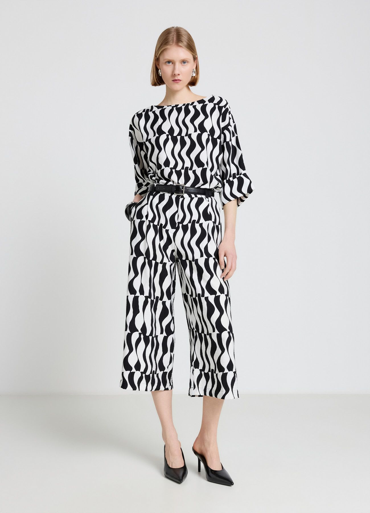 Blusa con maniche tre quarti stampa geometrica