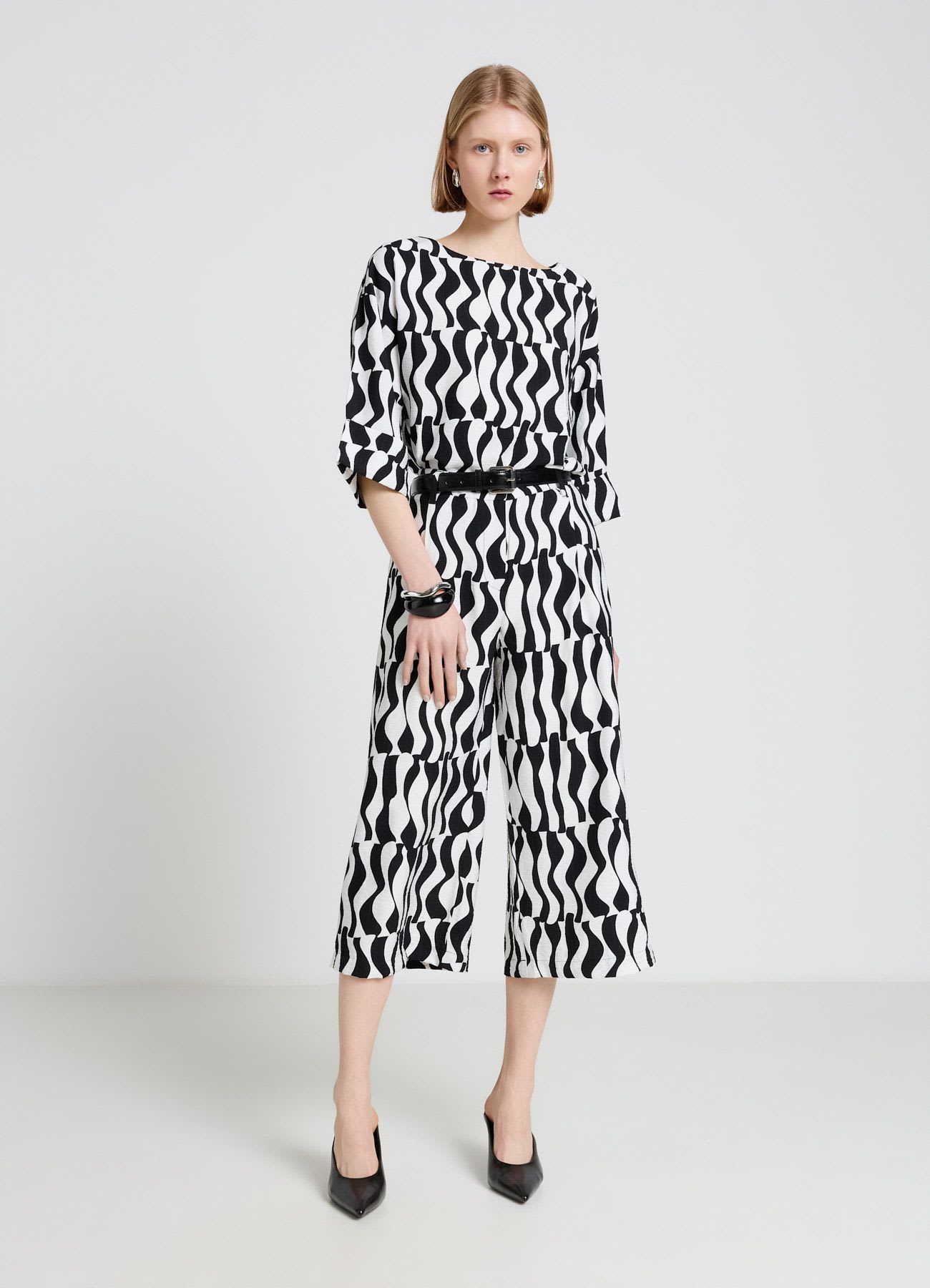Pantaloni palazzo crop ampio a fantasia