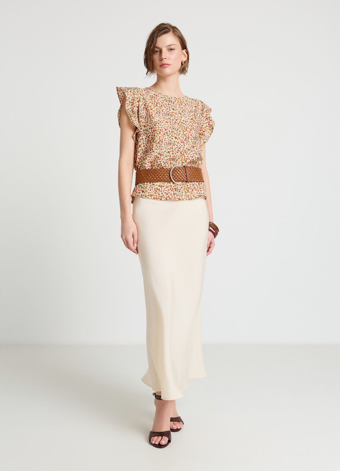 Blusa a fiori con maniche a rouche
