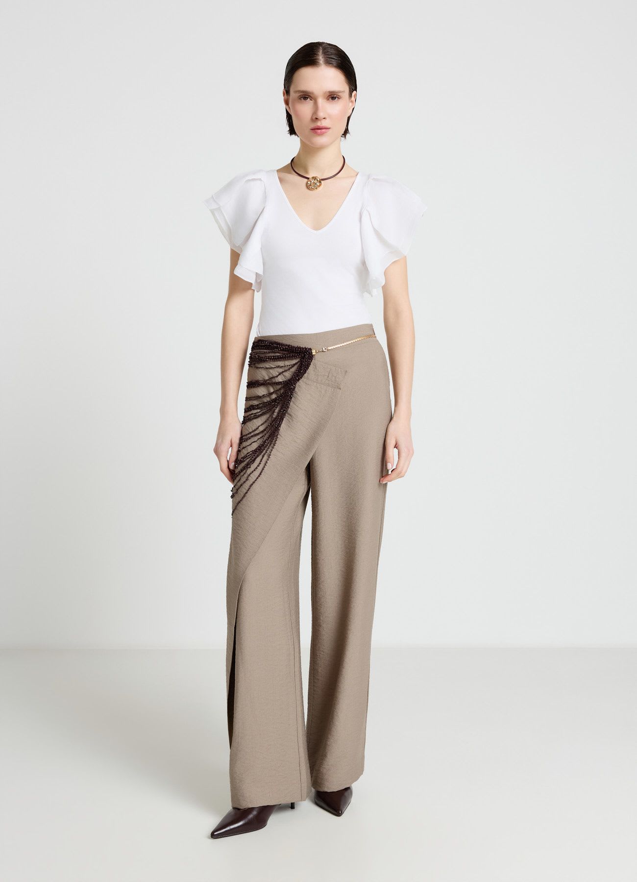 Pantaloni lunghi con pannello frontale sovrapposto