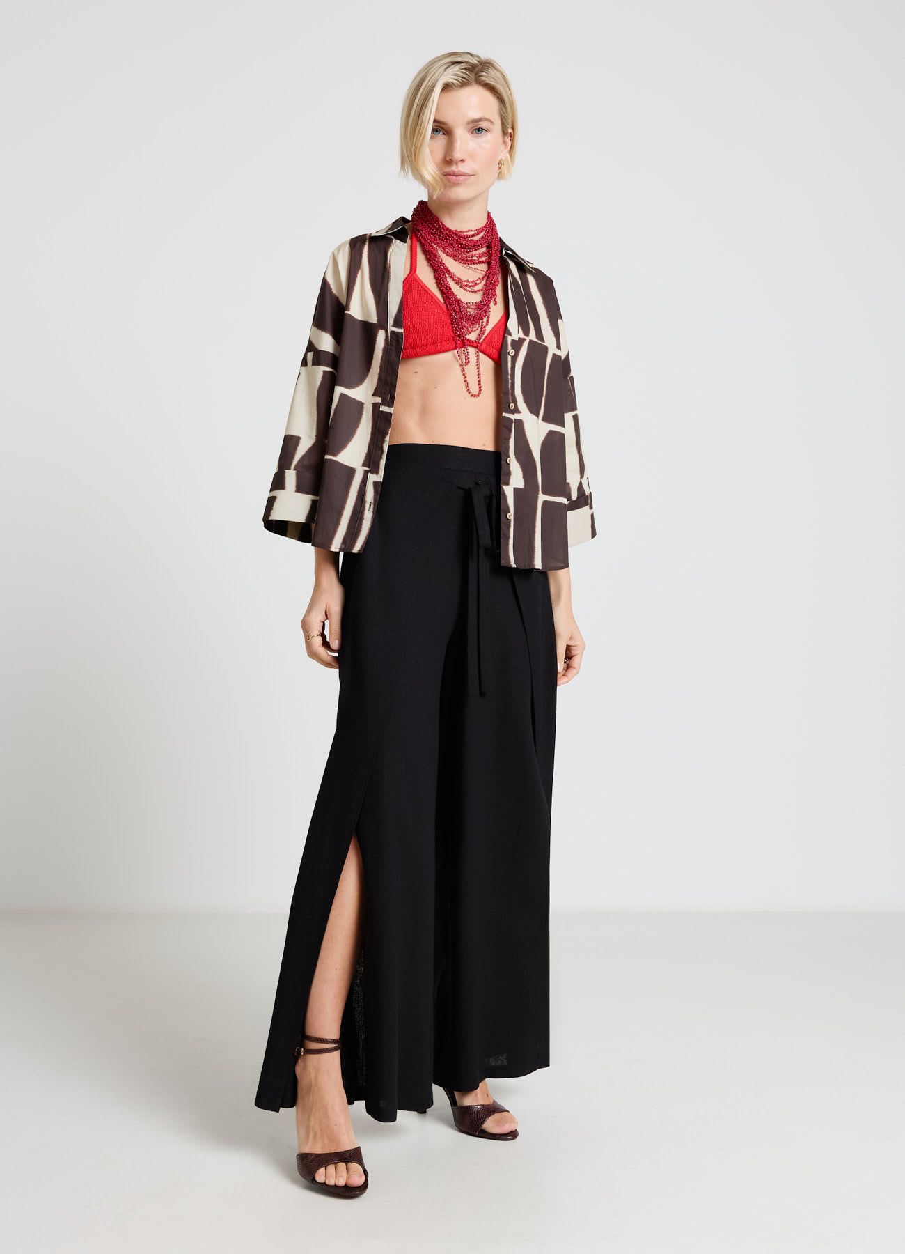 Pantaloni palazzo con cintura annodata