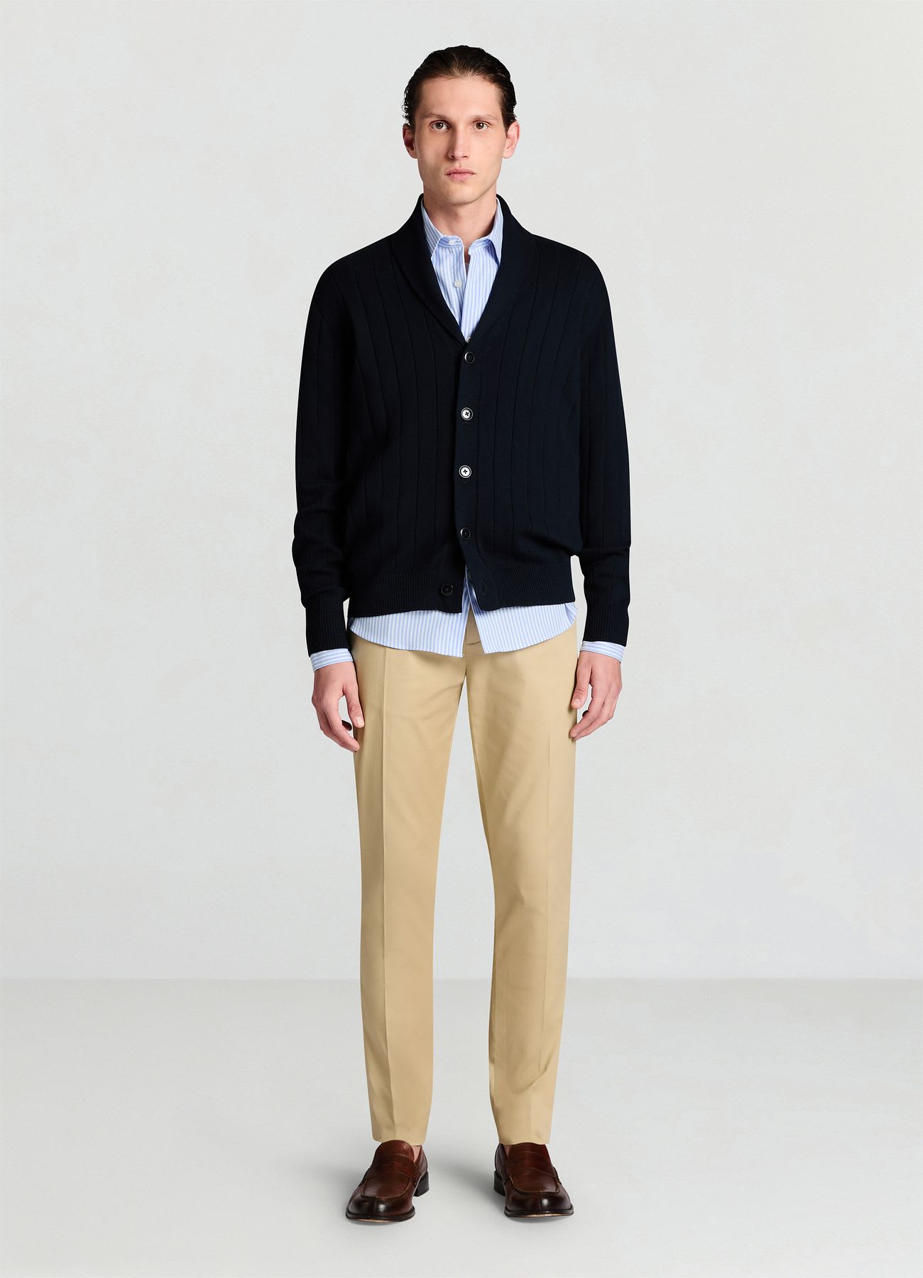 Pantaloni con tasche a filetto e pattina