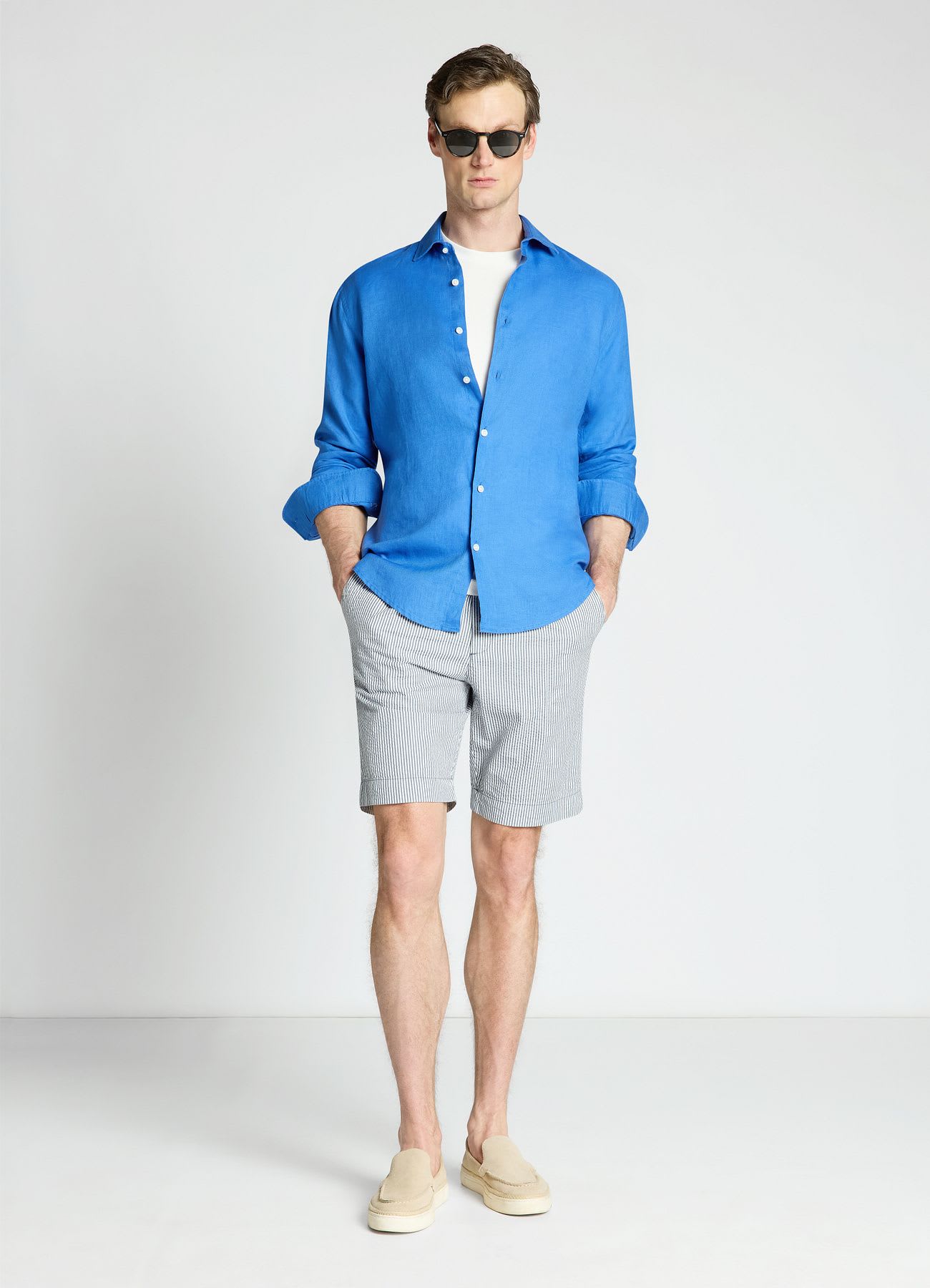 Pantaloncini bermuda a righe con risvolto