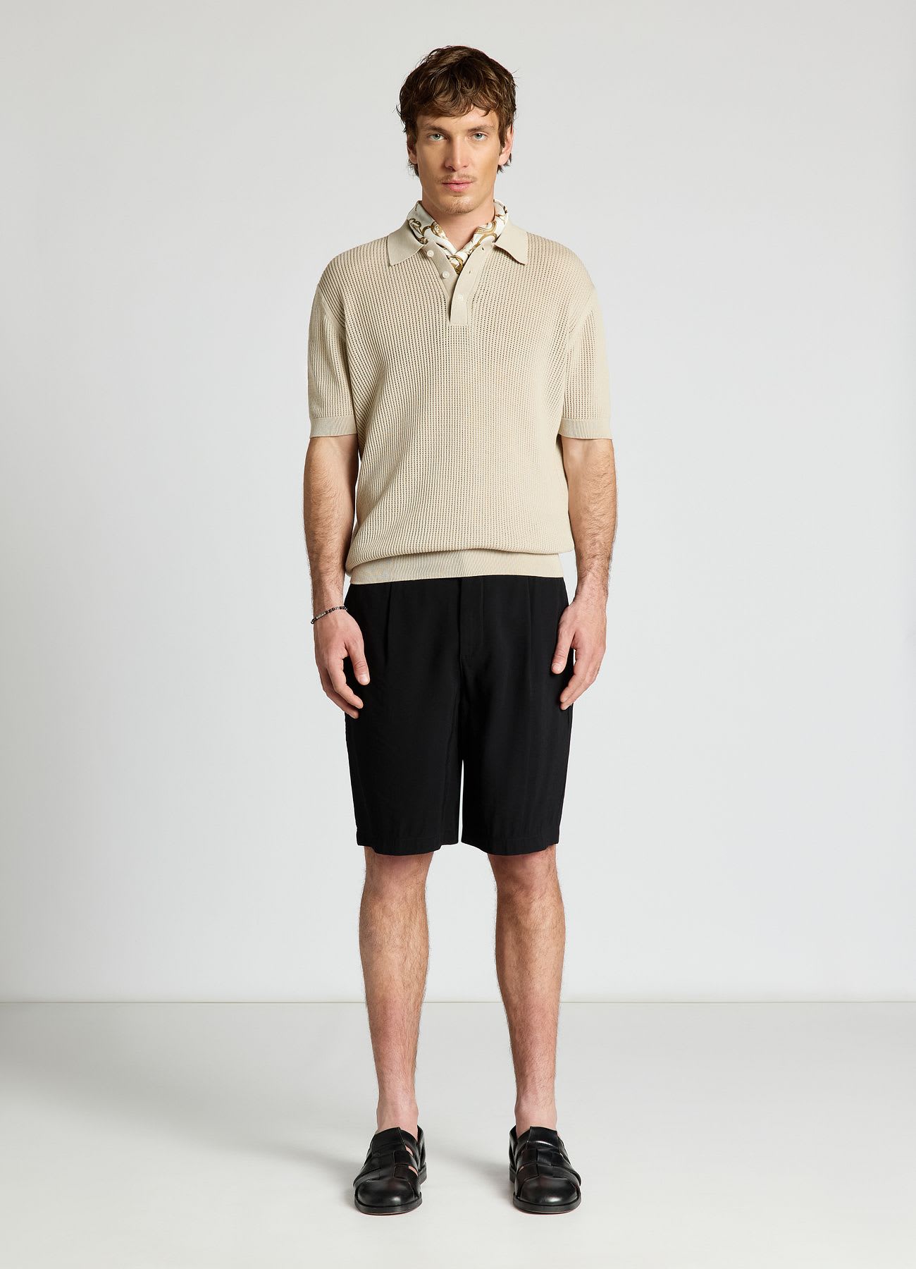 Pantaloncini bermuda con pieghe