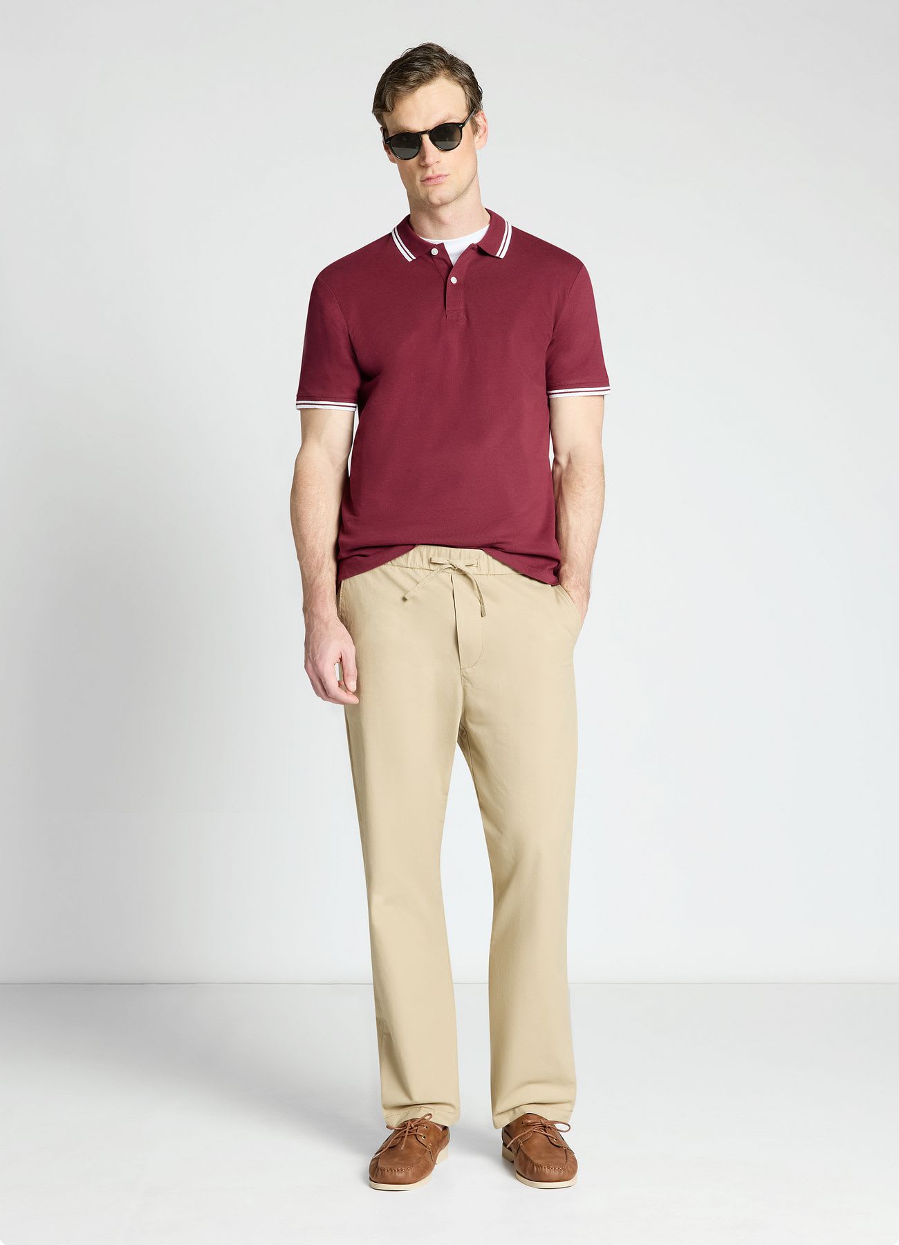 T-shirt polo con profili a righe