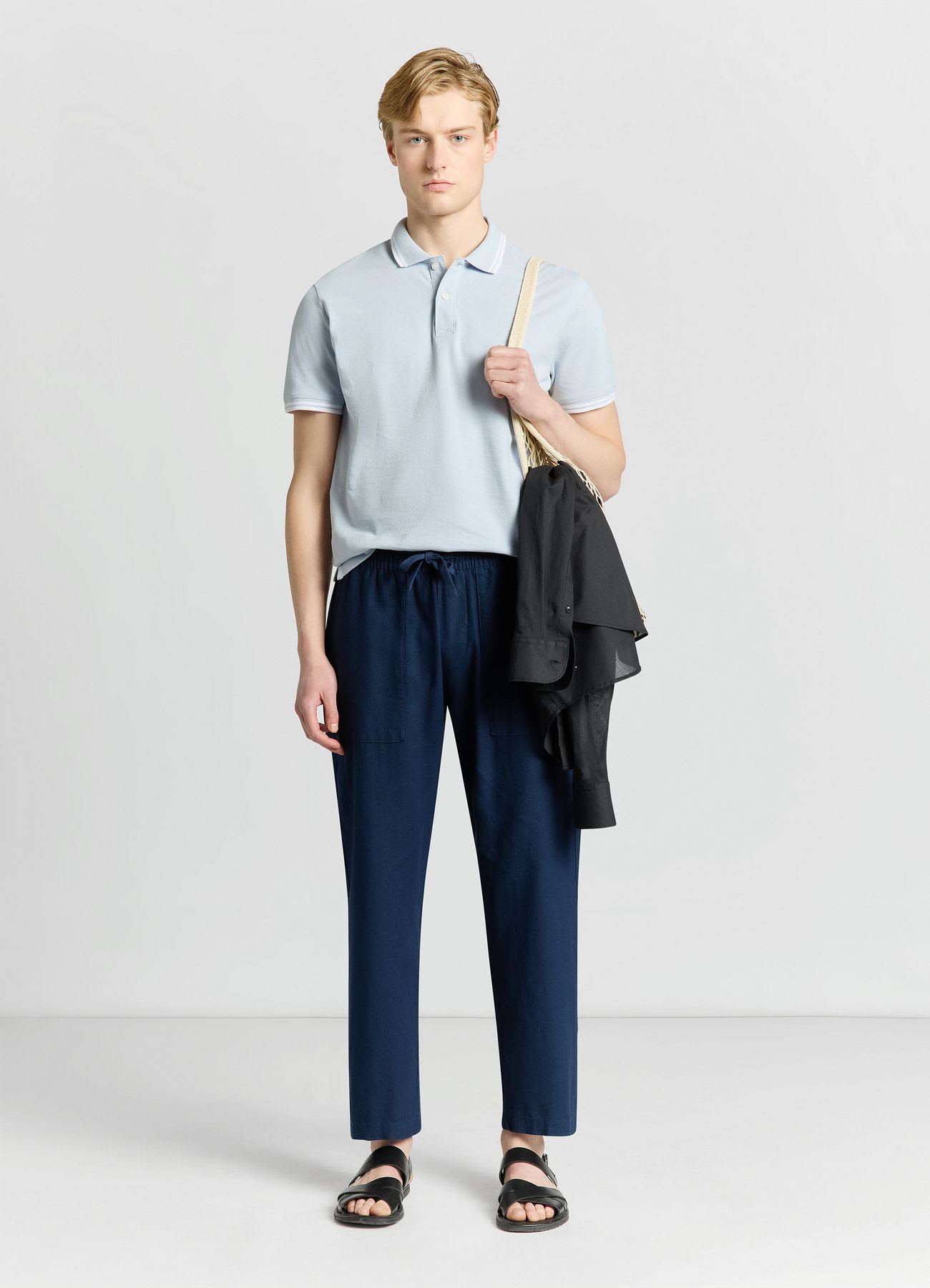 T-shirt polo con profili a righe