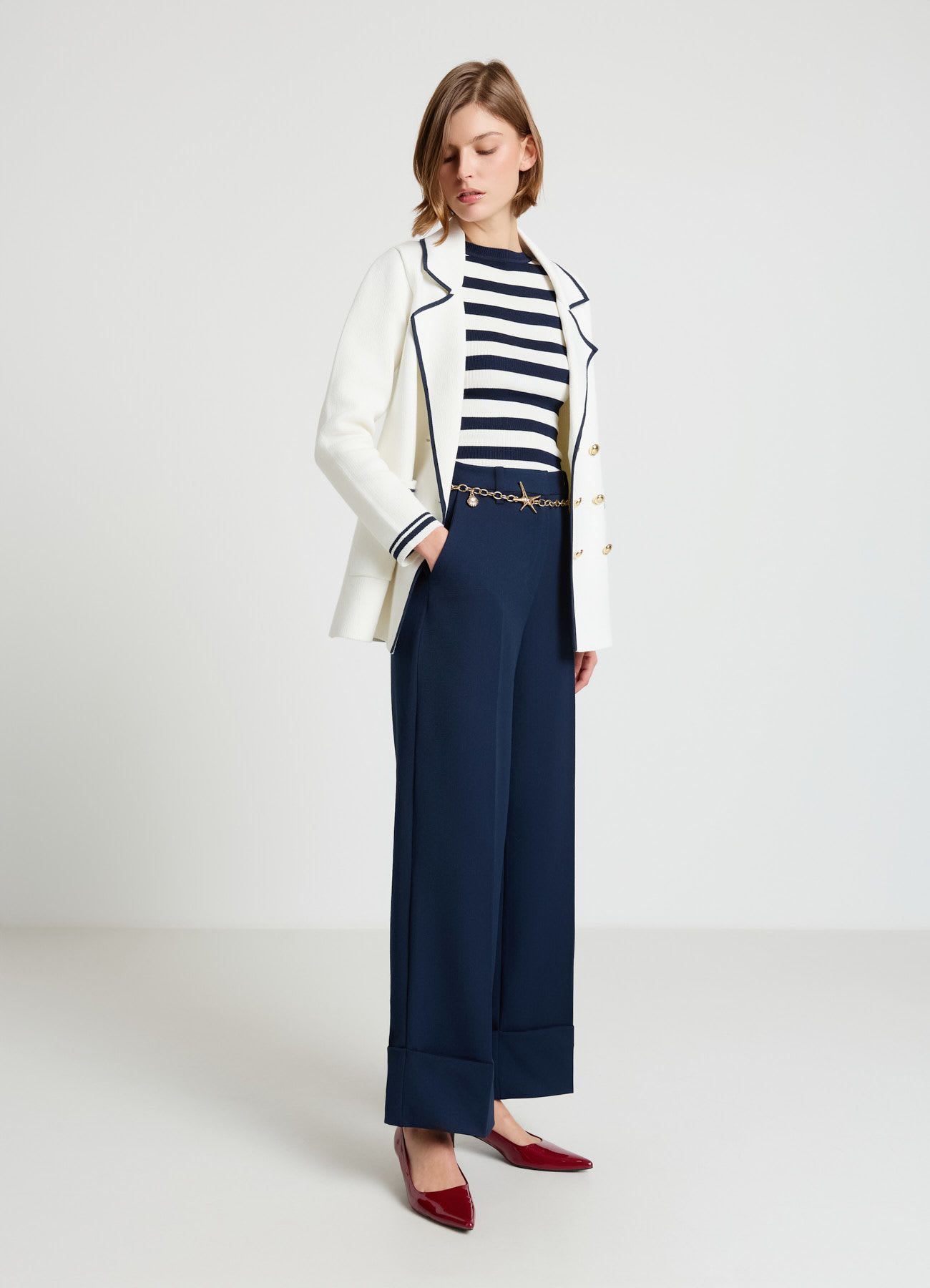 Pantaloni palazzo con risvolto