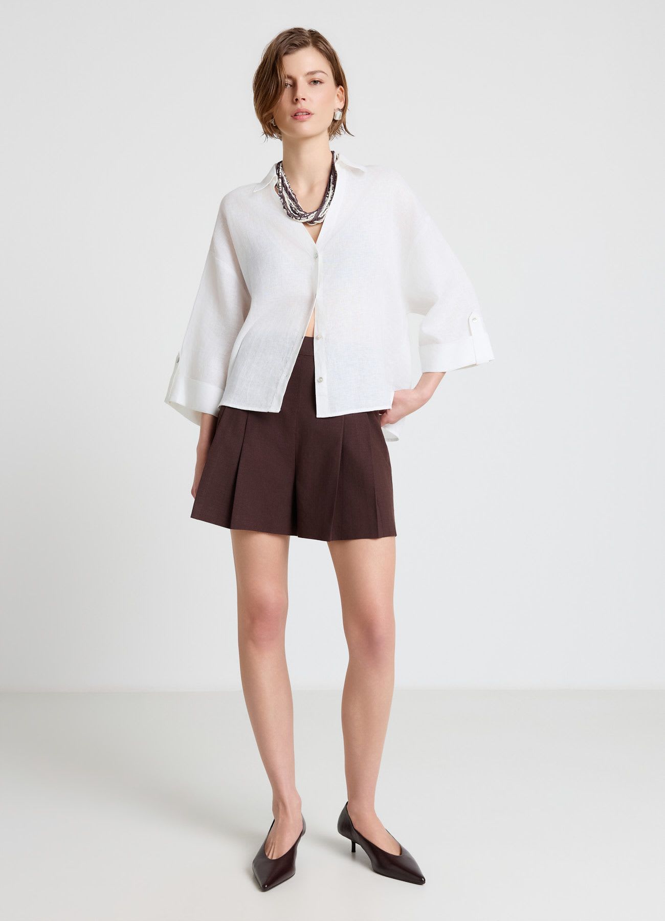 Shorts vita alta con pinces