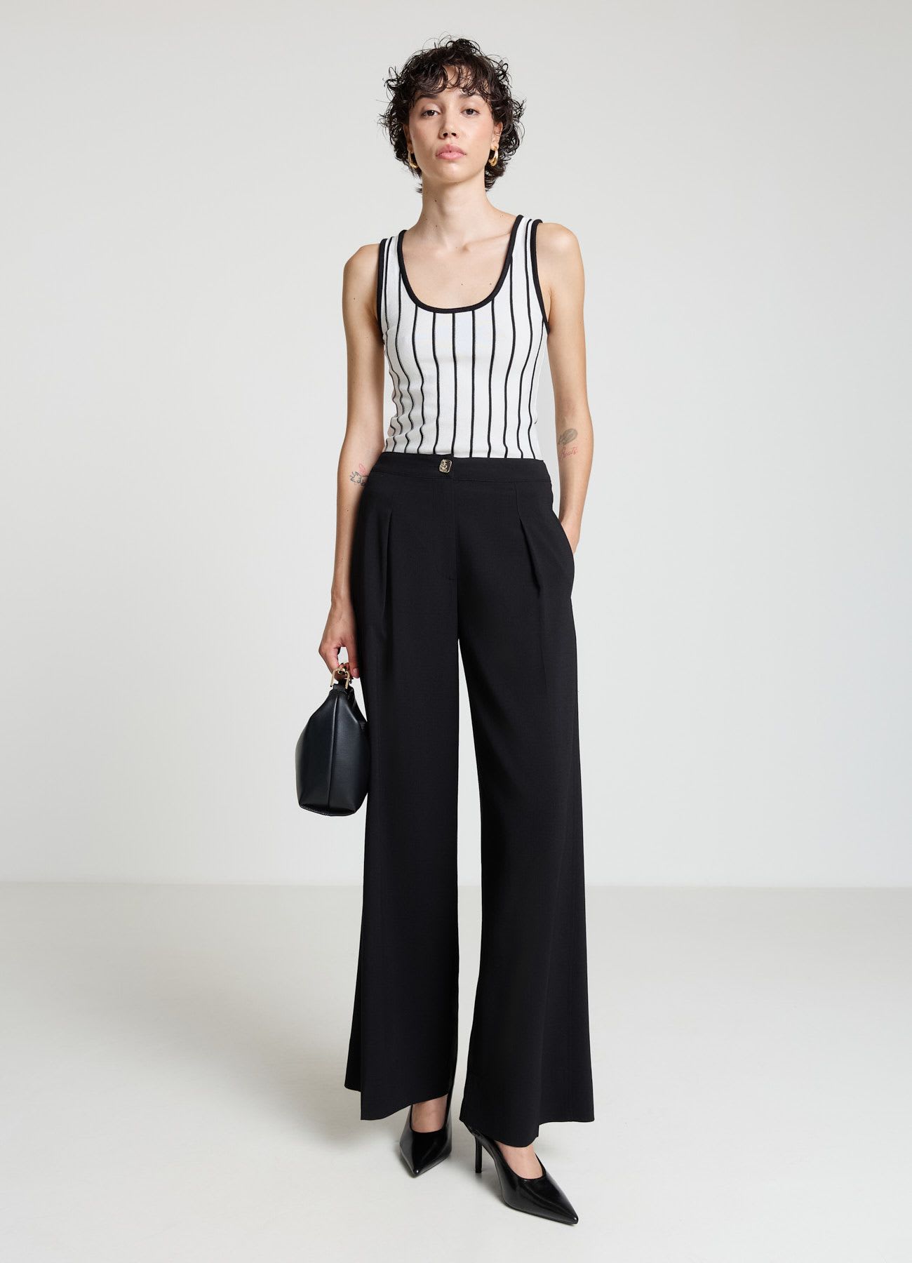 Pantaloni palazzo con pinces