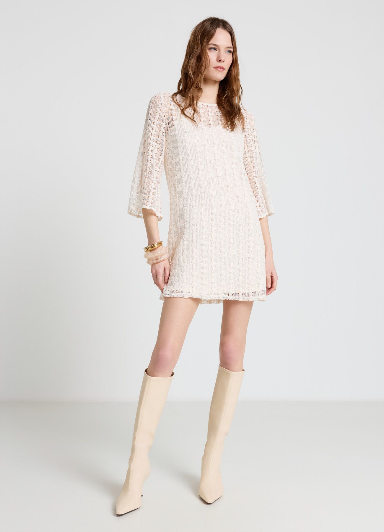 Vestito crochet con maniche tre quarti