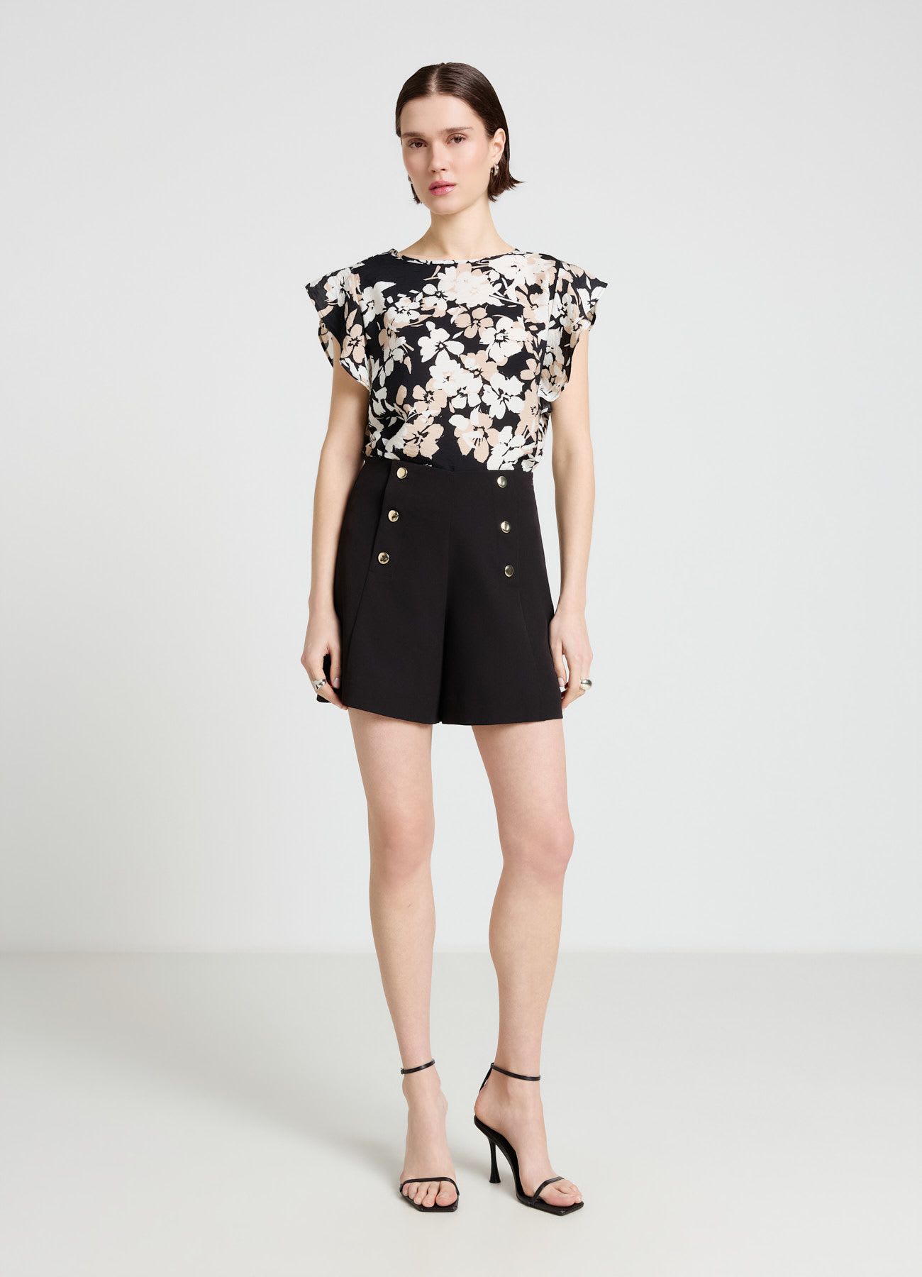 Blusa con stampa floreale e maniche con rouches