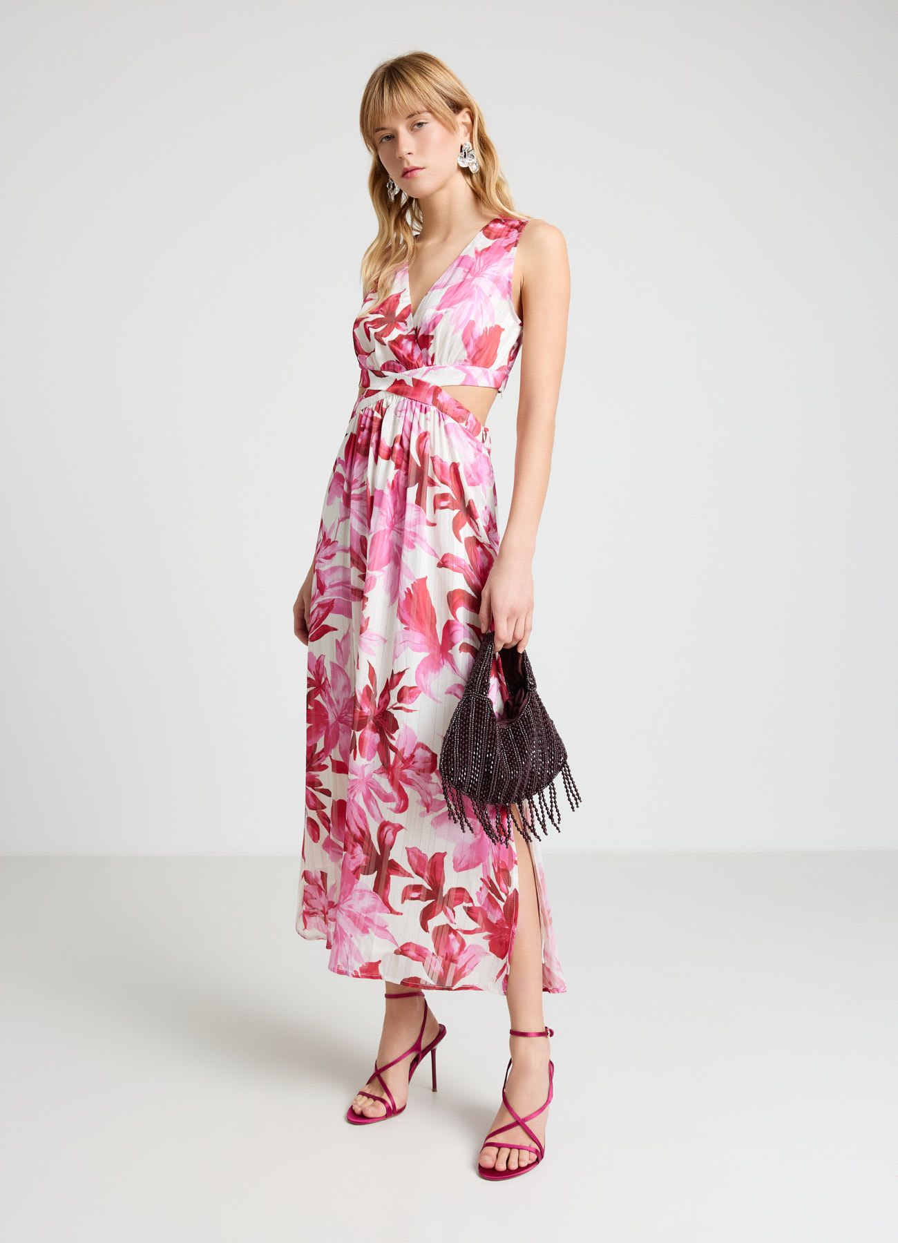 Vestito lungo con cut-out e stampa floreale