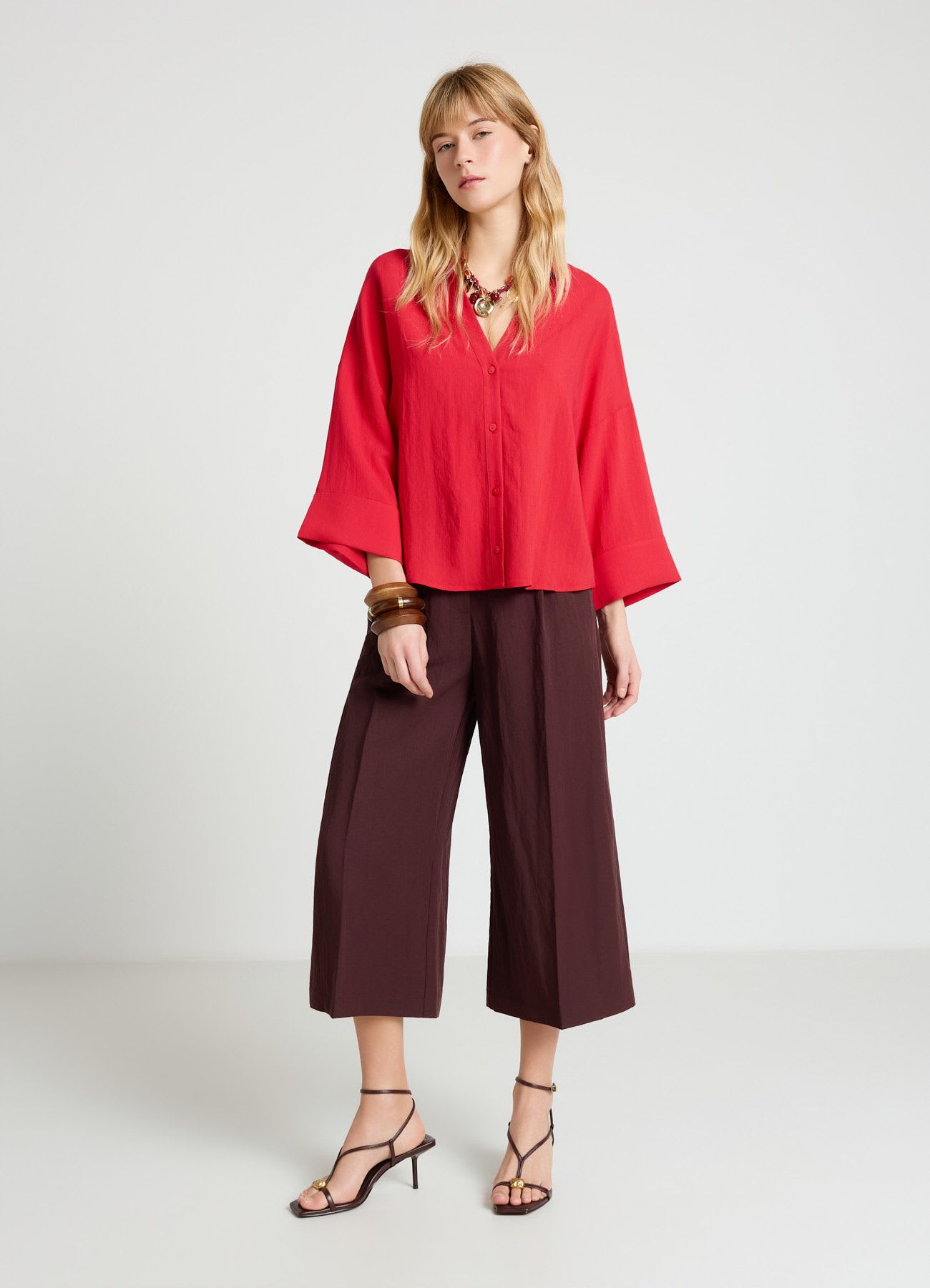 Pantaloni palazzo crop a tinta unita