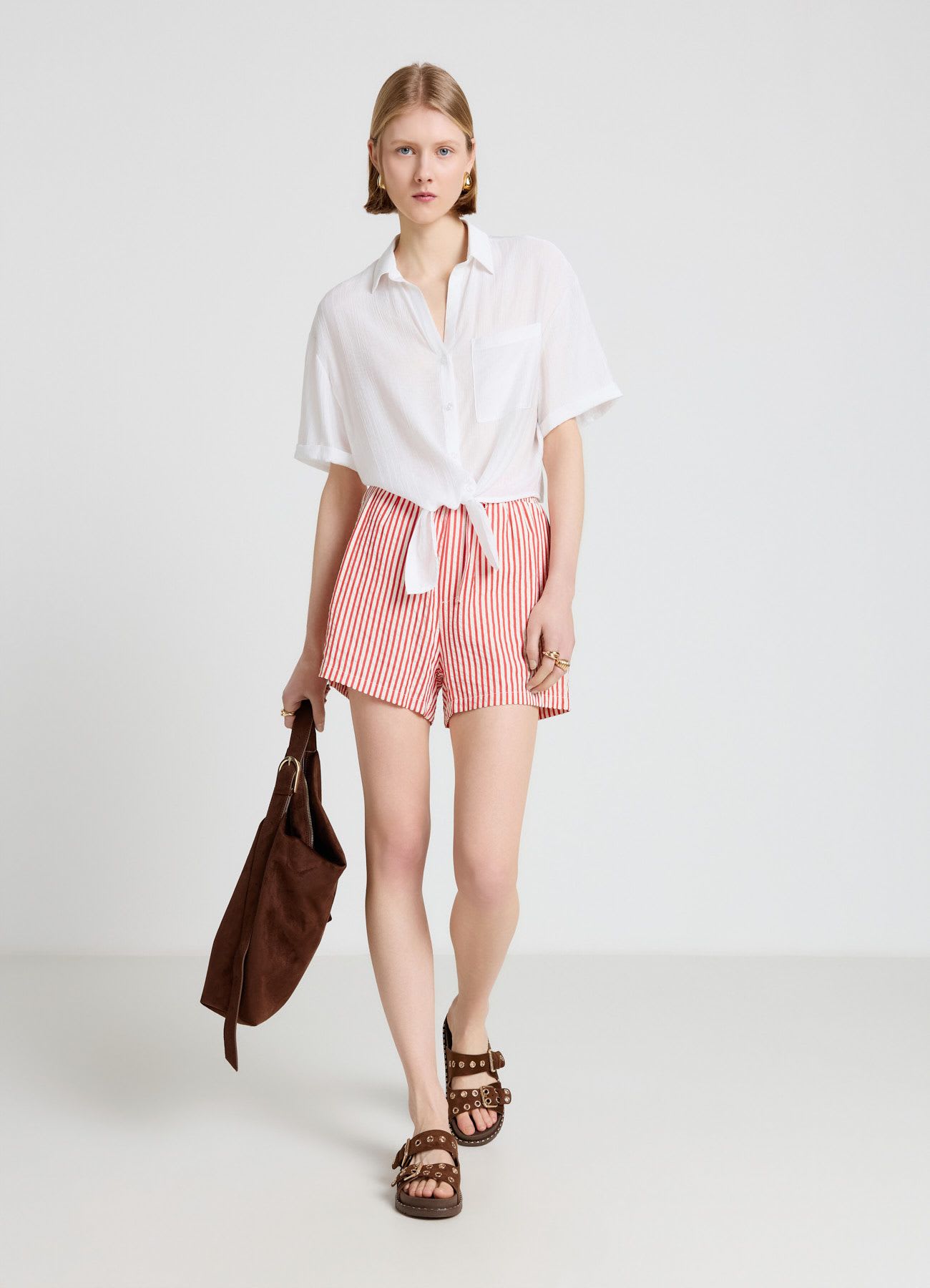 Shorts a righe con coulisse in vita