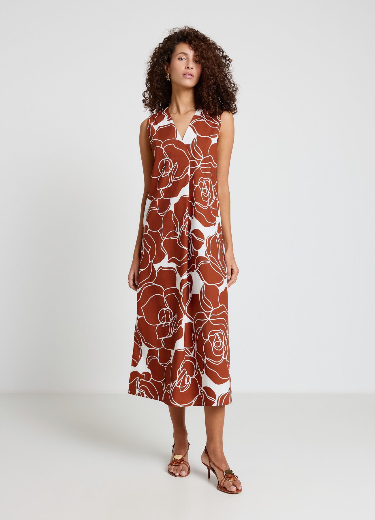 Vestito lungo smanicato con stampa fiori
