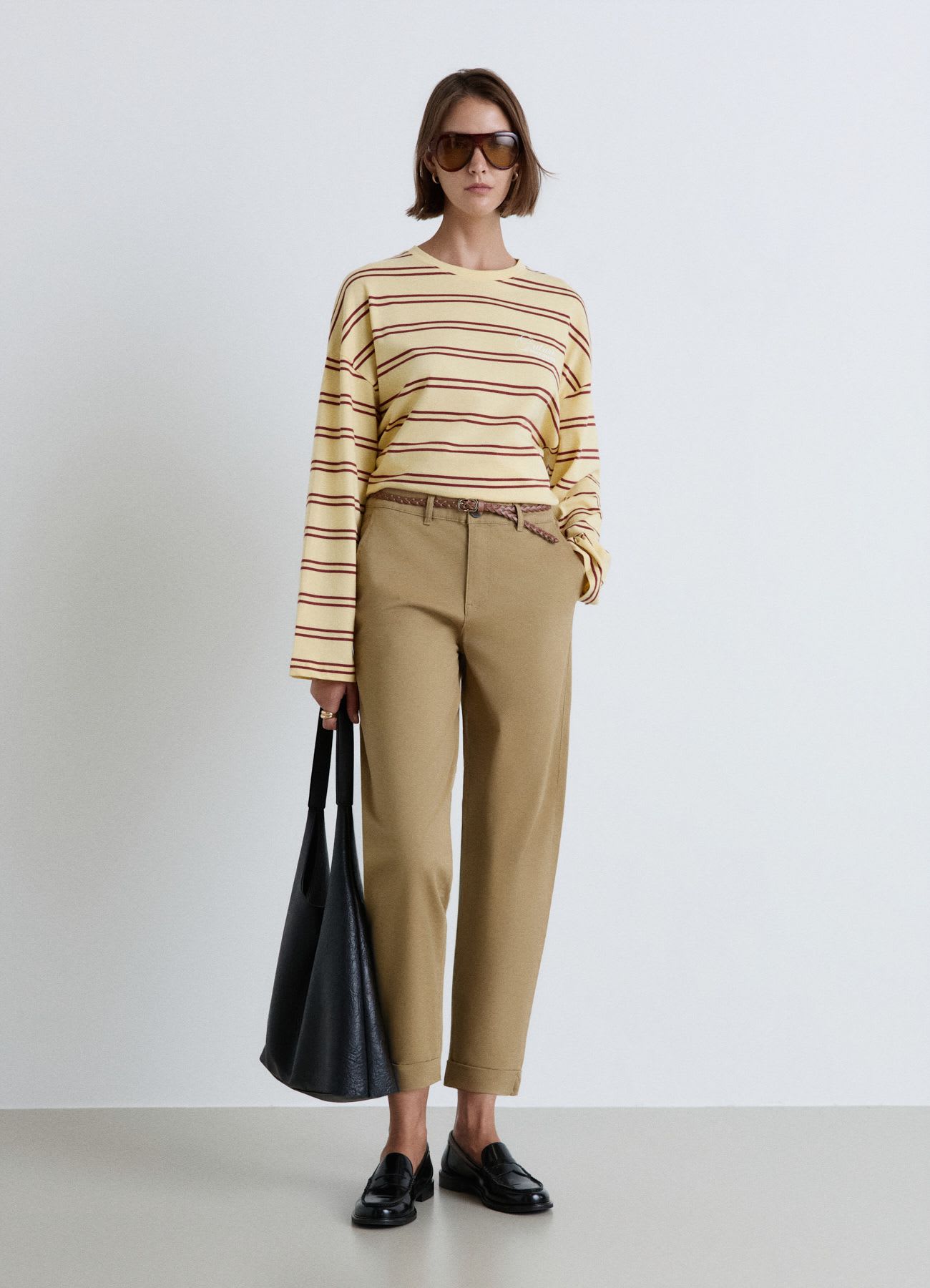 Pantaloni chino con cintura intrecciata