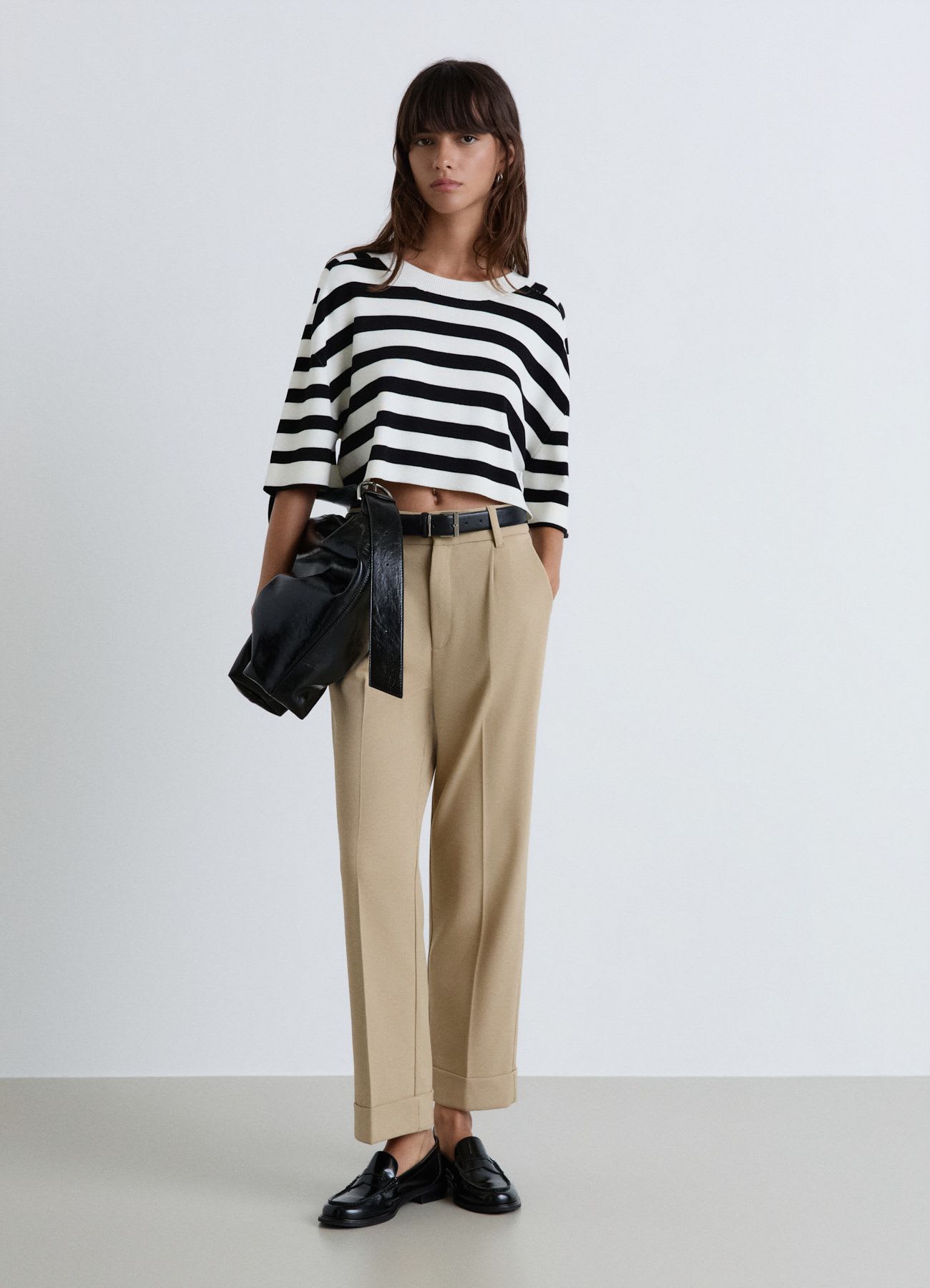 Pantaloni con elastico in vita e risvolto
