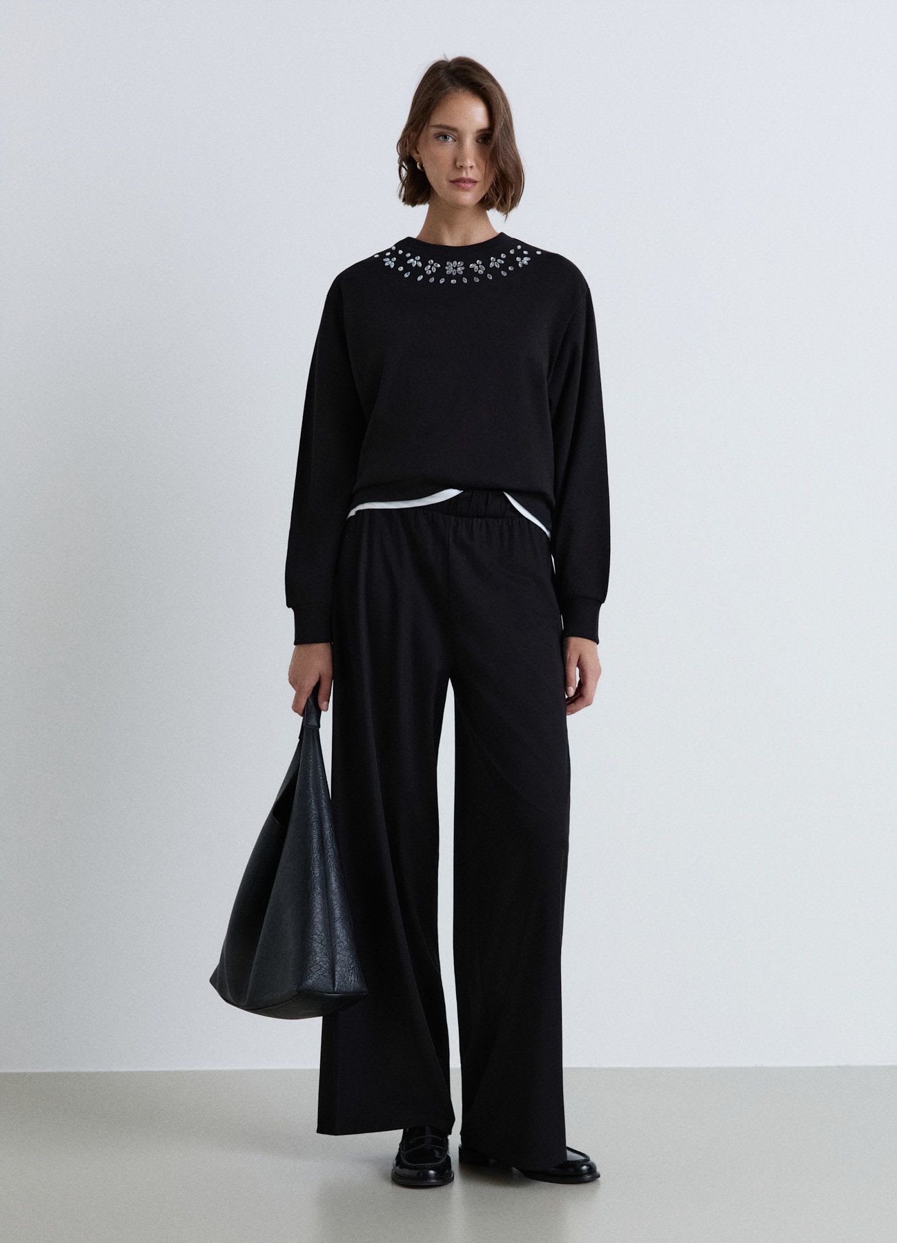 Pantaloni a gamba ampia con vita elastica