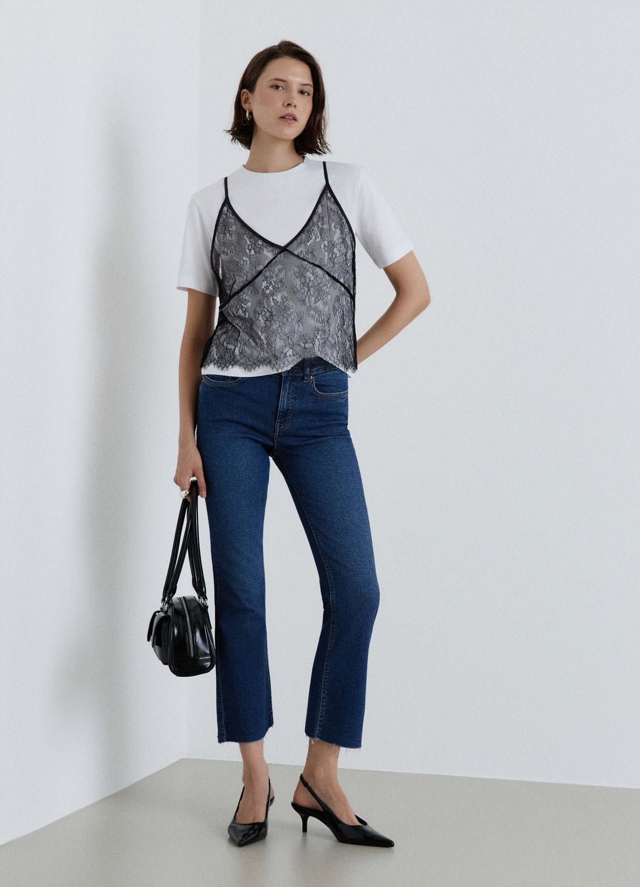 Jeans crop flare a tinta unita