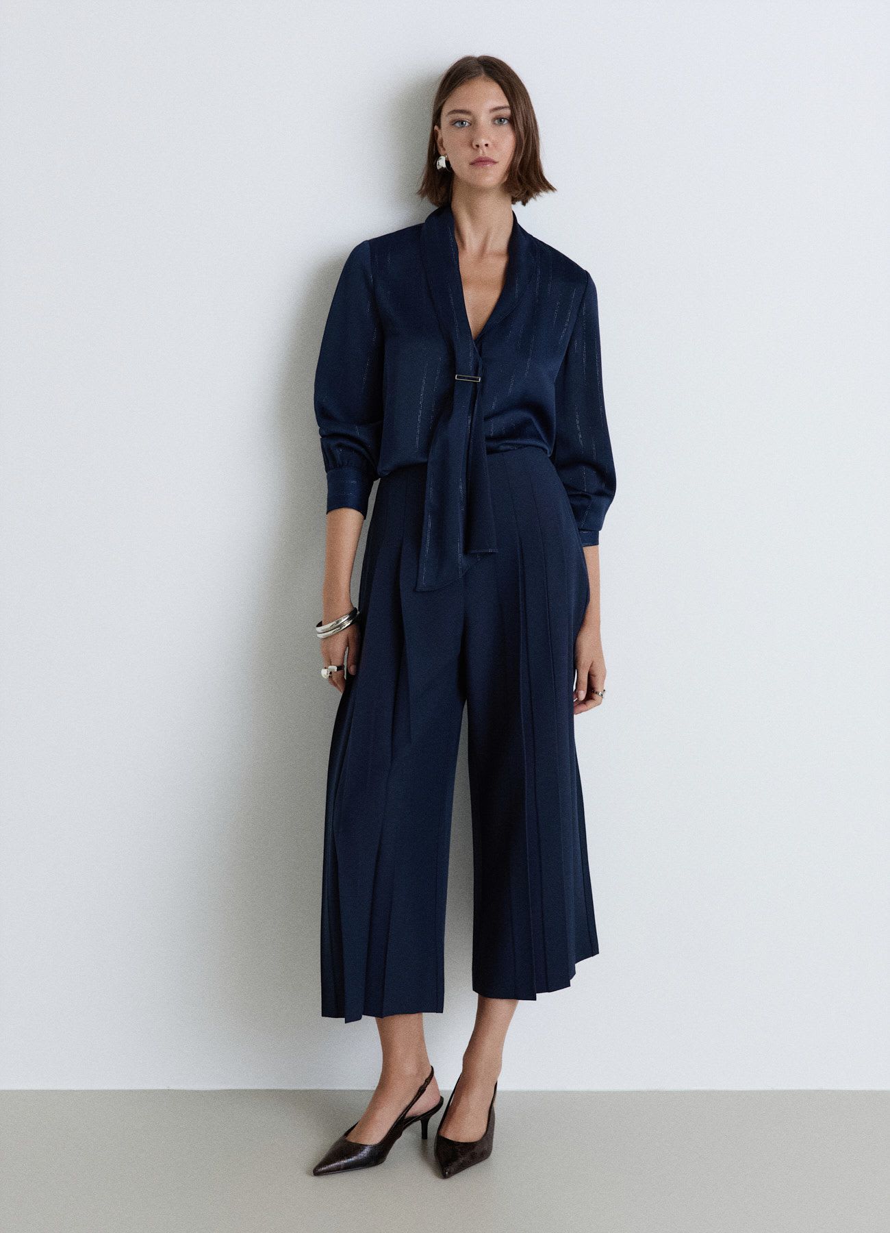 Pantaloni culotte con pieghe