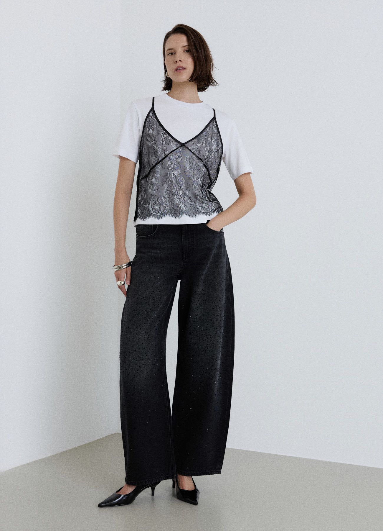 T-shirt con top in pizzo sovrapposto