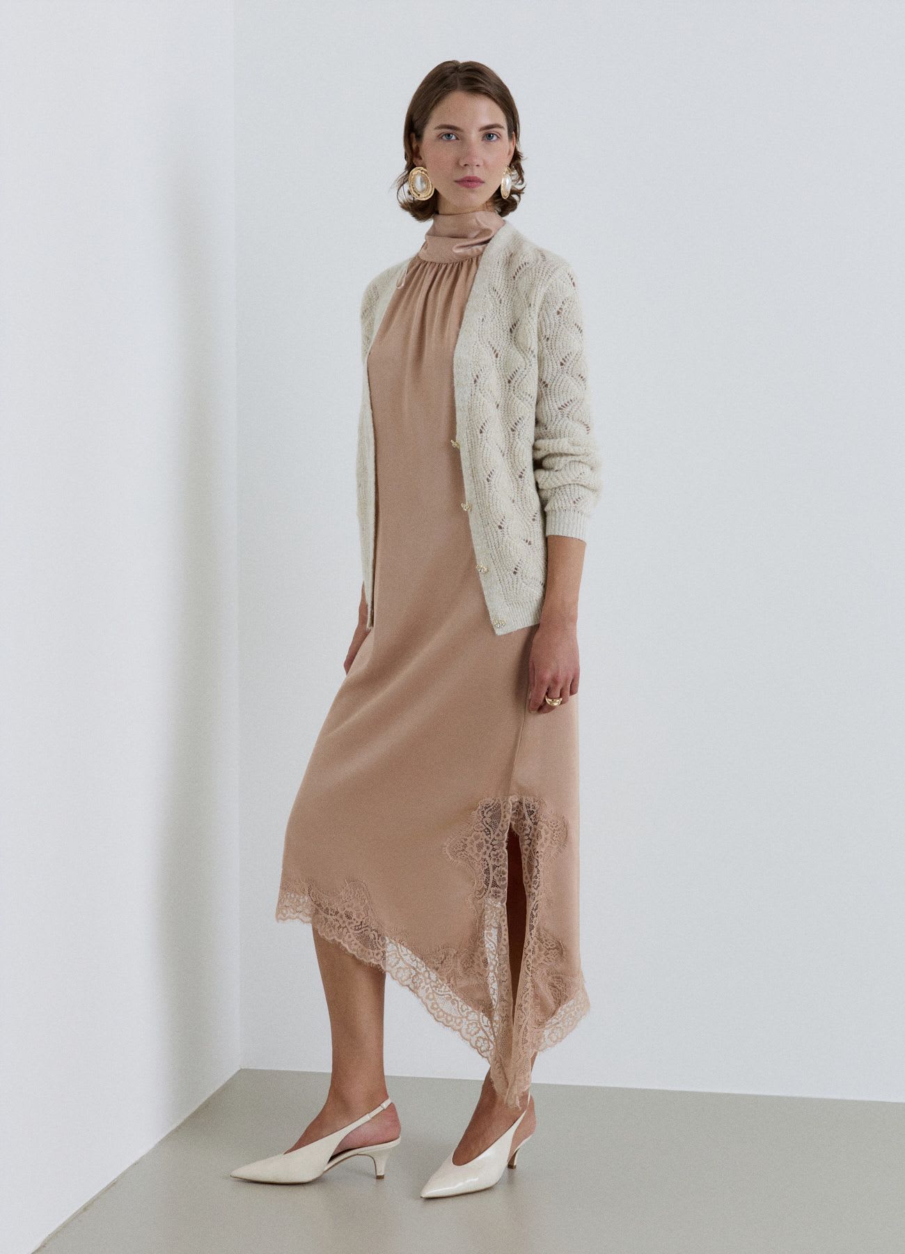 Cardigan traforato con bottoni effetto luccicante