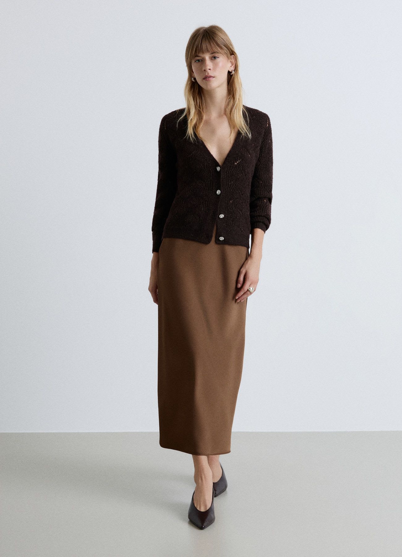 Cardigan traforato con bottoni effetto luccicante