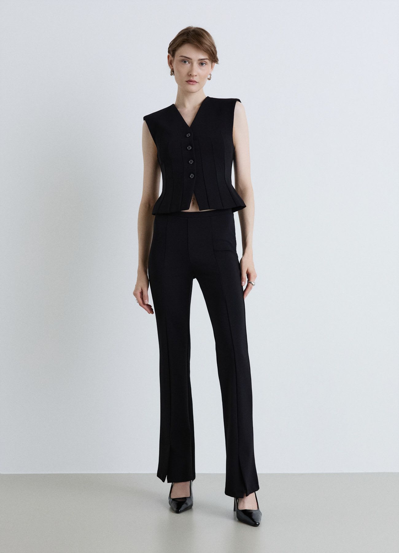 Leggings flare con spacchetti
